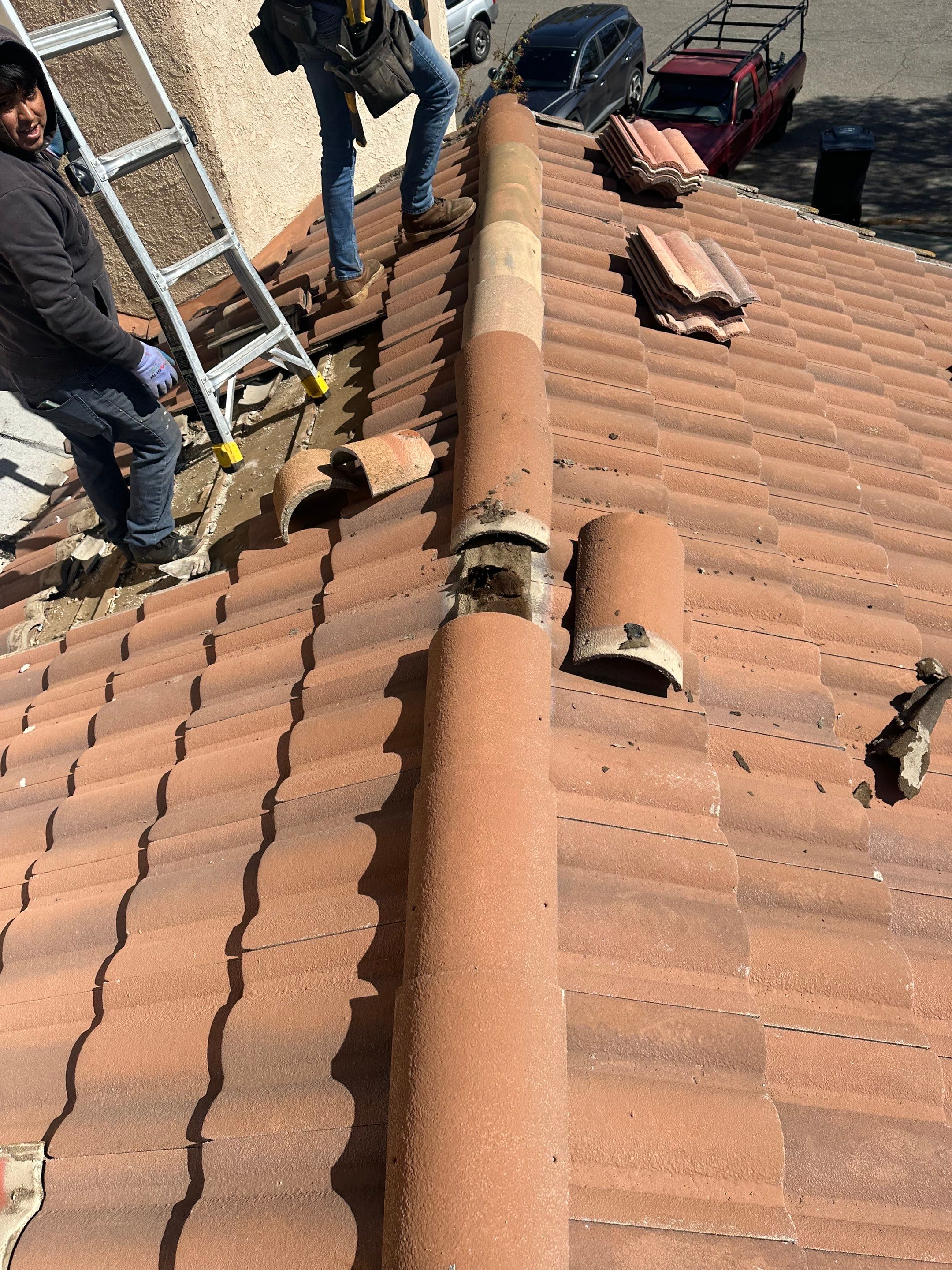 Tile Roof repair by Grandmark Service Company