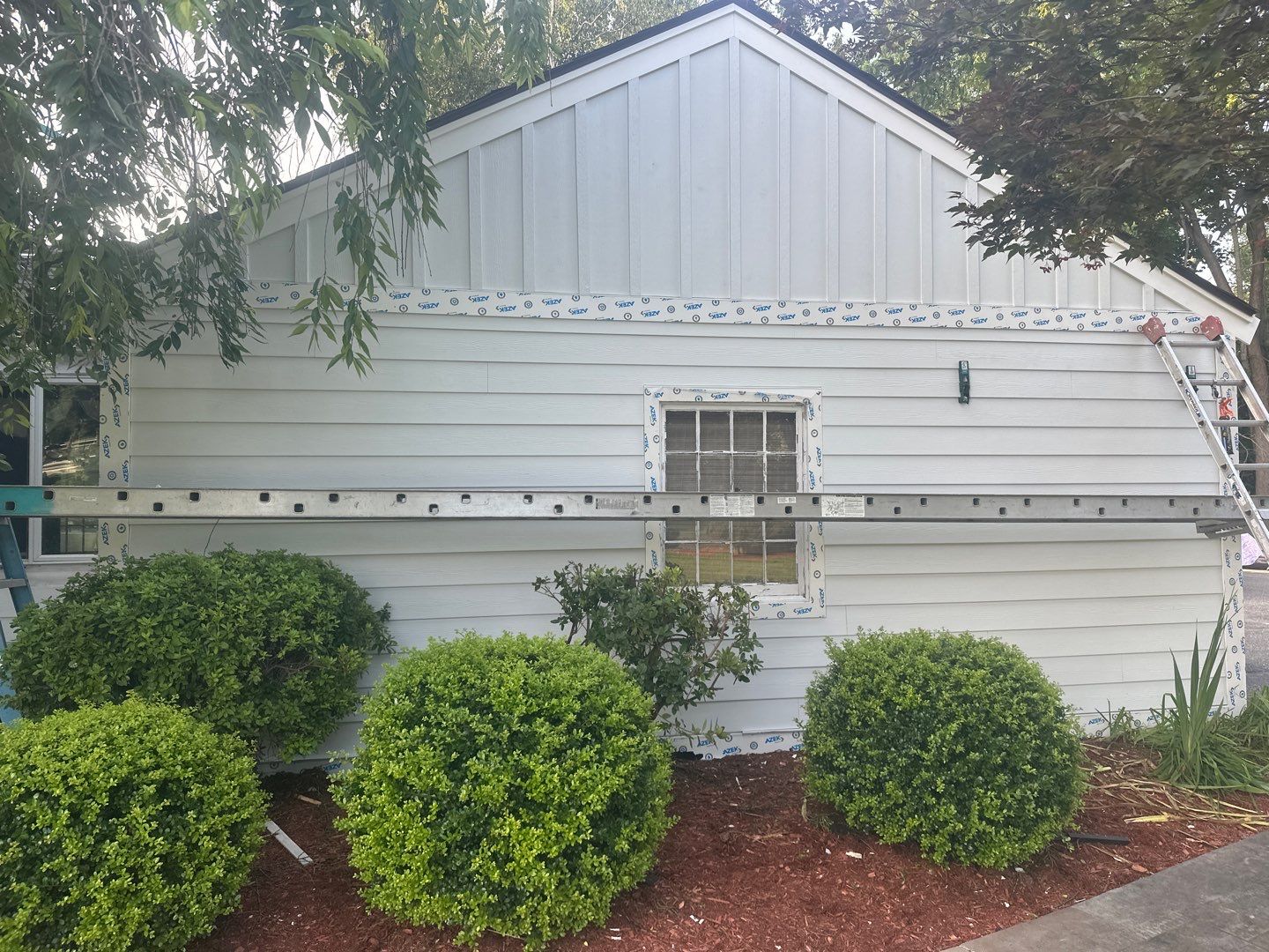 Siding Installation using Hardie Plank Artic white by A Plus Exterior