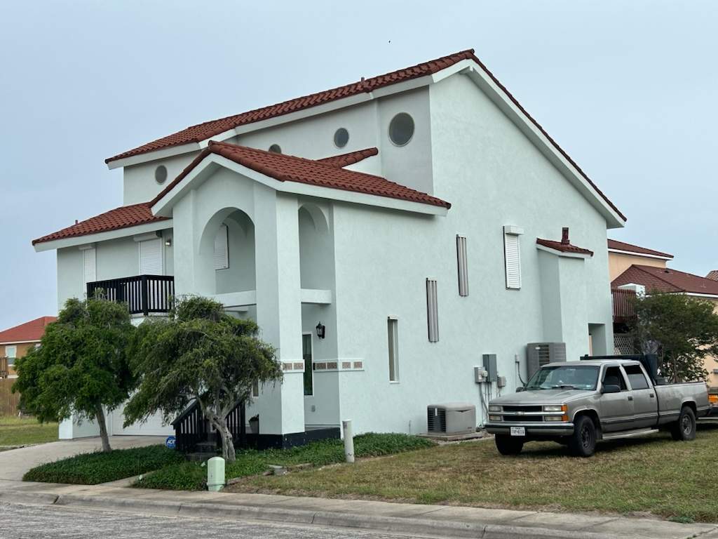 Waterfront Stucco Remastered by Bayfront Roofing and Construction