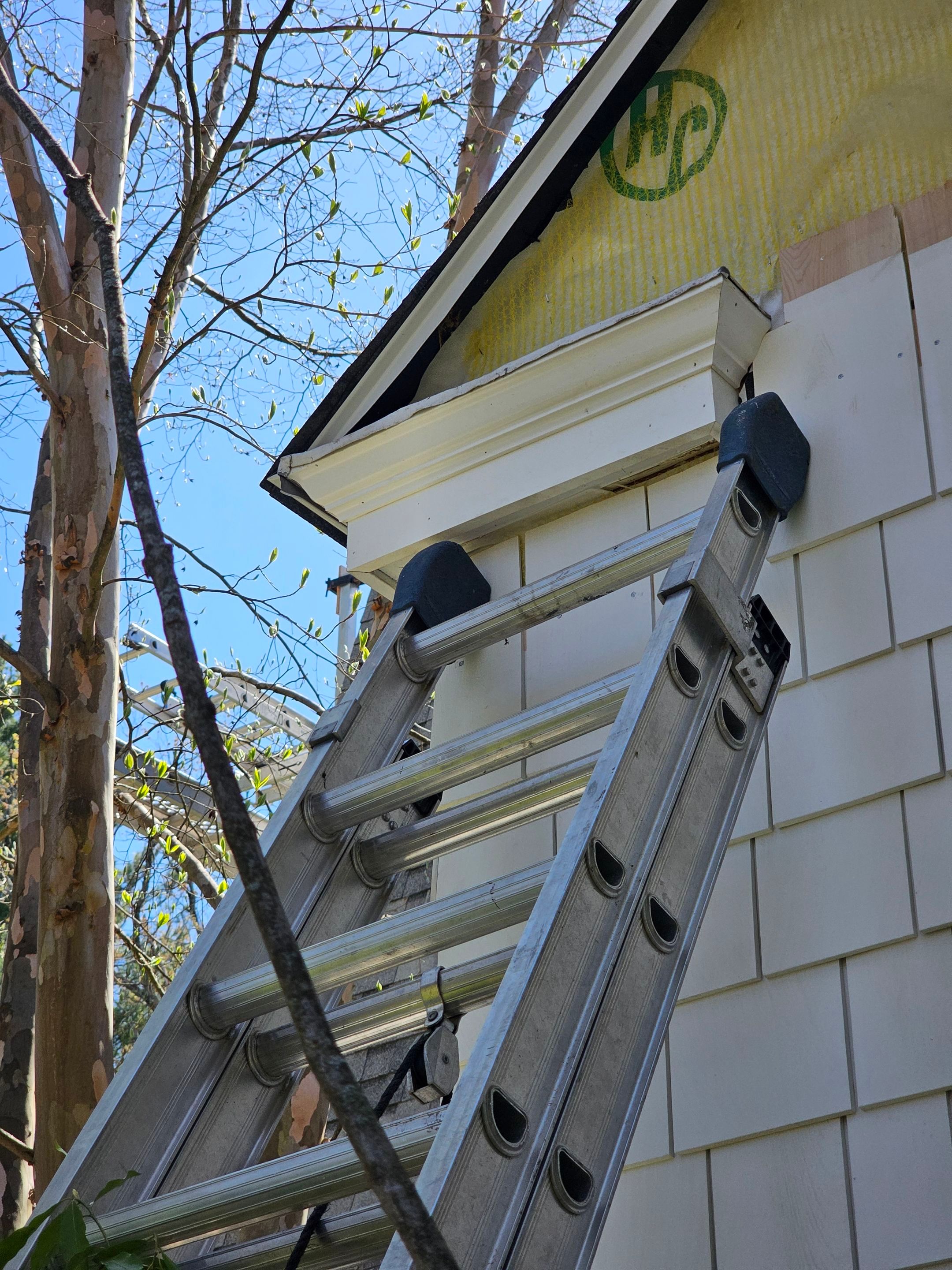 White cedar shingles and windows in Wayland, MA by UBrothers Construction