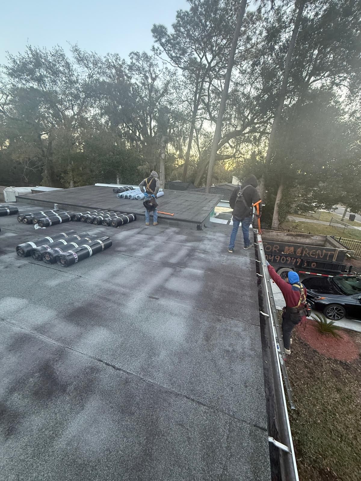 Flat Roof Renovation Due to Water Accumulation by urban green energy llc