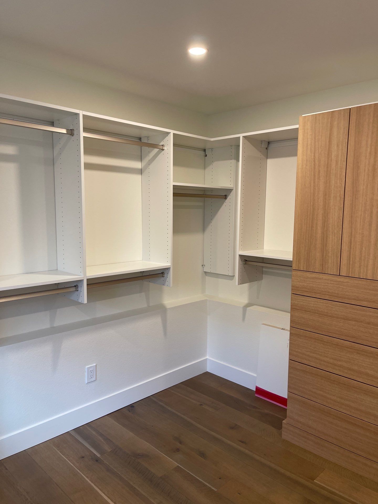 Two-Tone Walk-In Closet in Boulder by Concept 32, Inc.