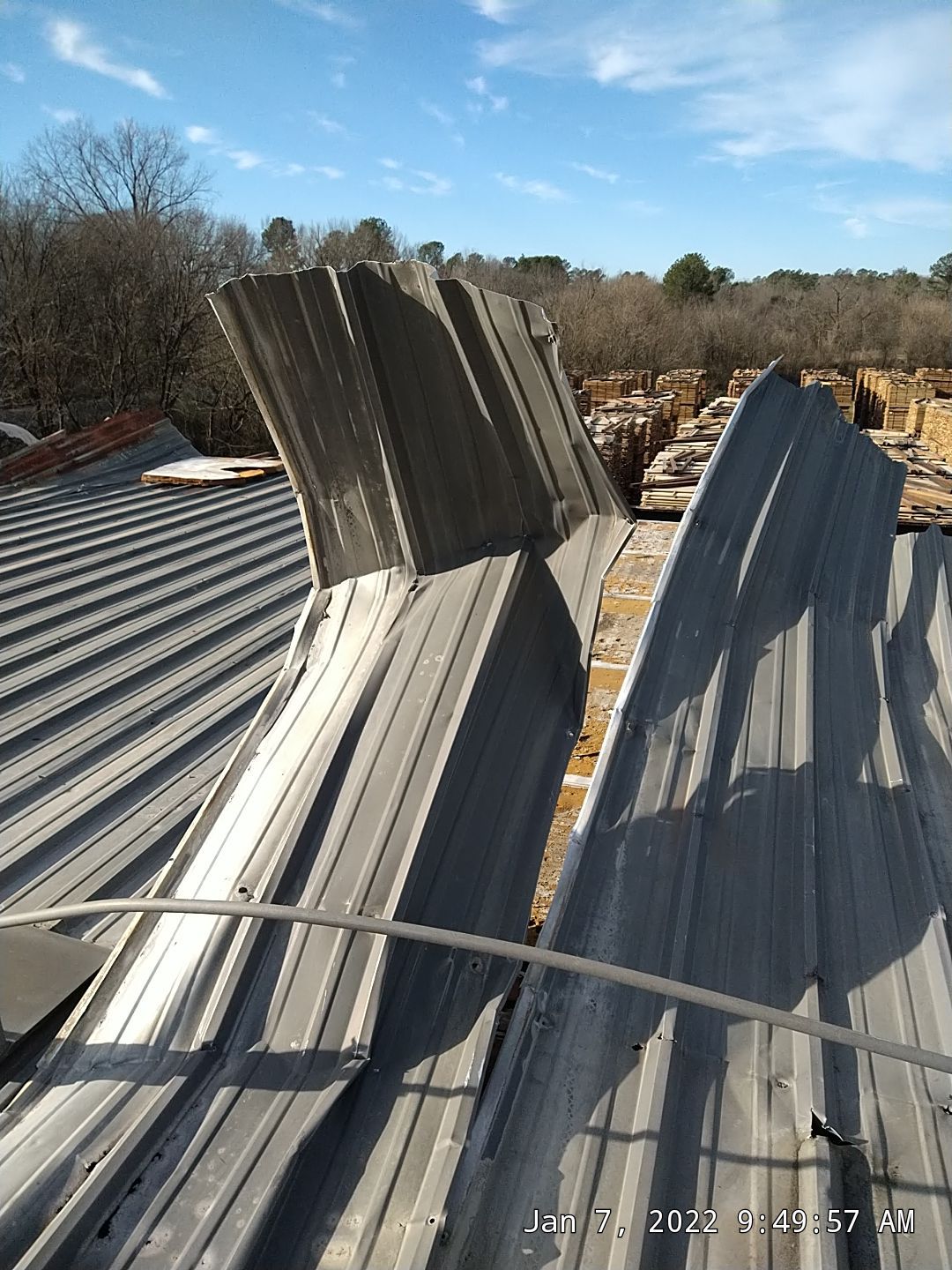 Commercial Roofing Installation using Aluminum Roofing panels by Hostetler Roofing