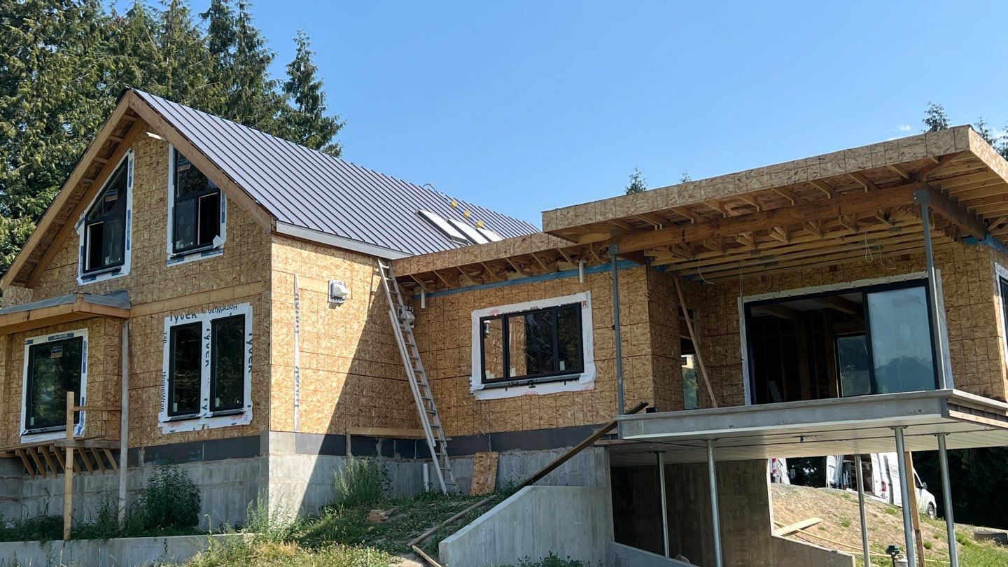 Residential Roofing Installation using multiple products by Top Notch Roofing Inc