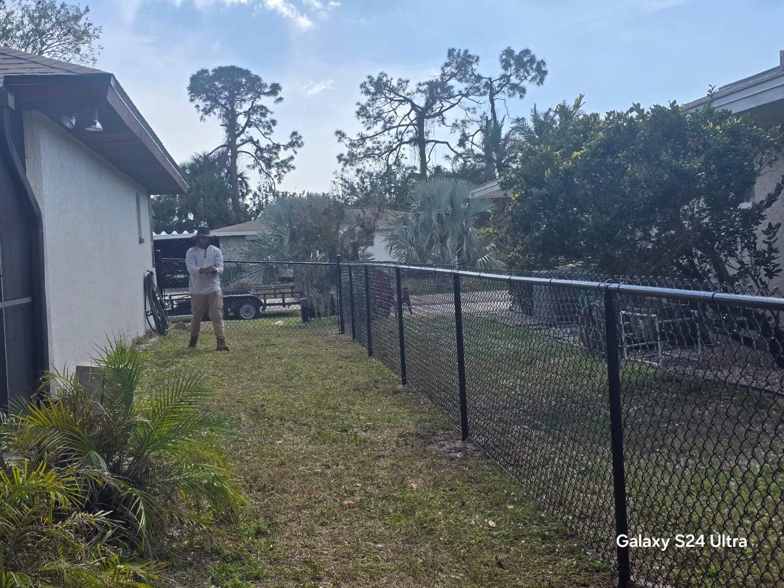 Black Chain Link Fence Installation for Port Charlotte Residence by True Fence LLC