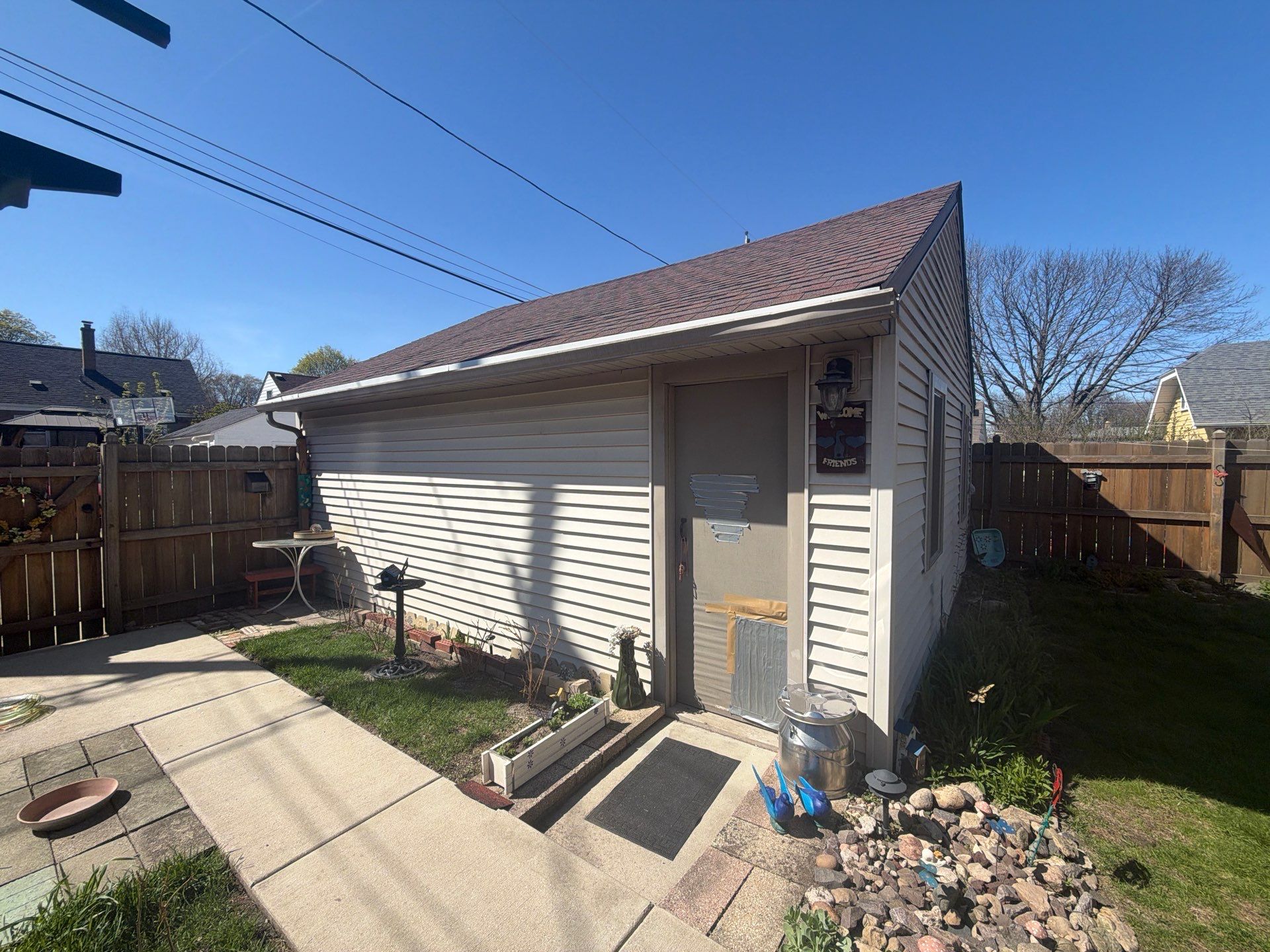 New Wooden Deck and Front Entry Stair Installation in Milwaukee by OCS Contracting Services