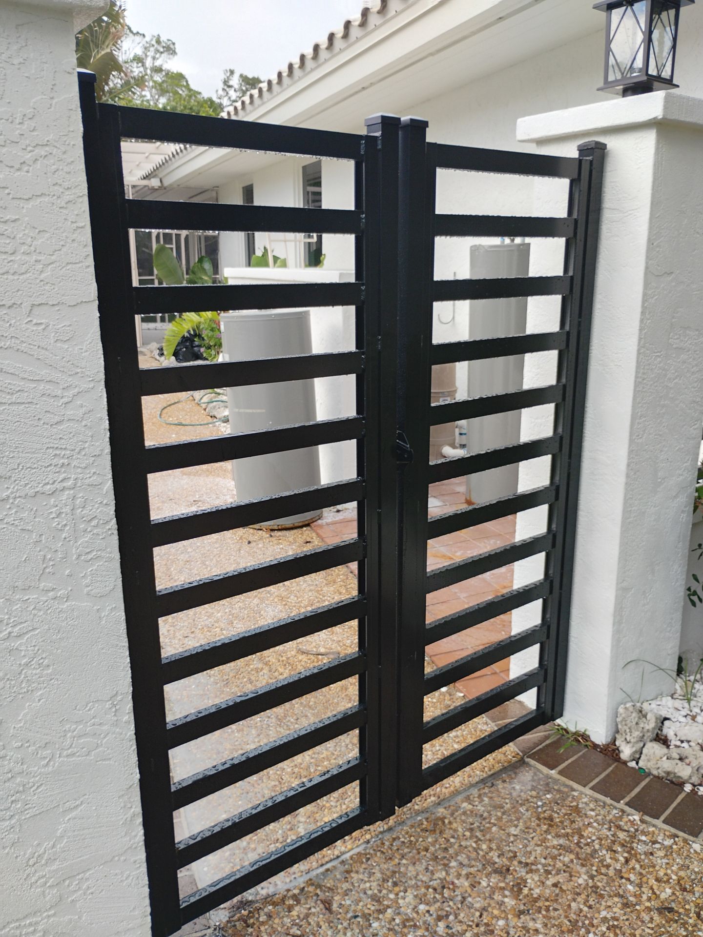 Custom Aluminum Horizontal Slat Fencing and Decorative Gates in Siesta Key by True Fence LLC