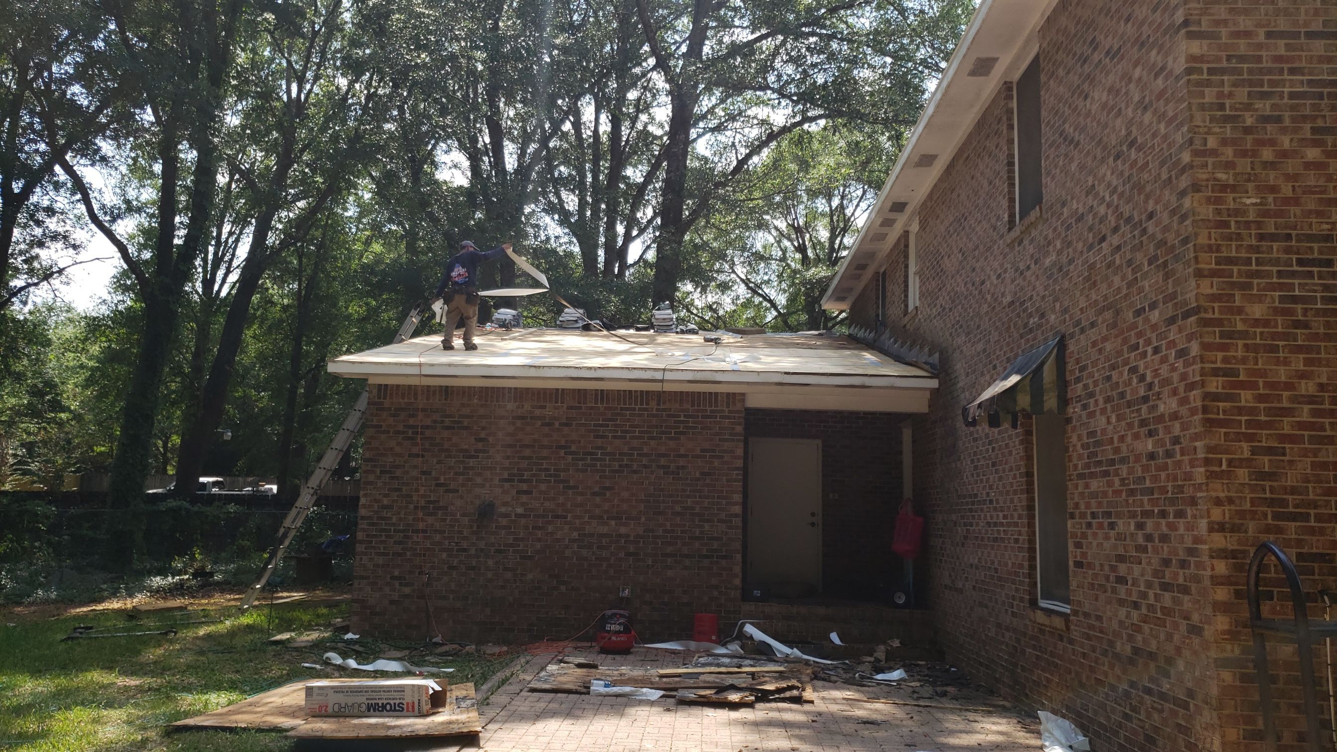 Residential Roofing Installation using Roof Replacement by American Roofing & Construction LLC