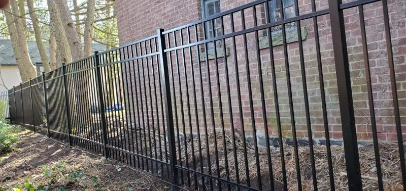 Black Aluminum fence  by DiGiorgi Roofing and Siding Inc