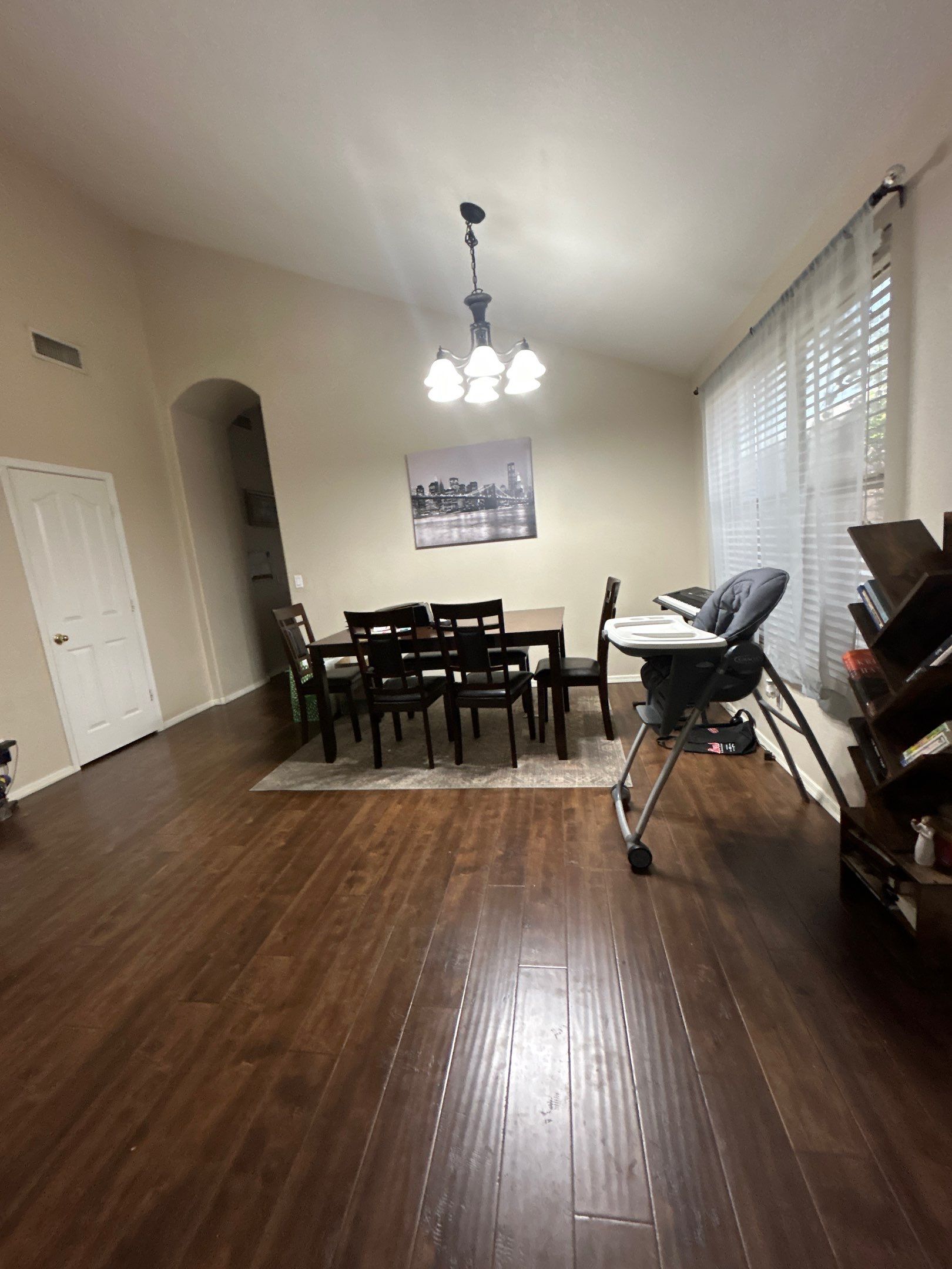 Modern Dining Room Renovation Featuring Wood Look Plank Flooring in Chandler by CompanyCam Sales Demo