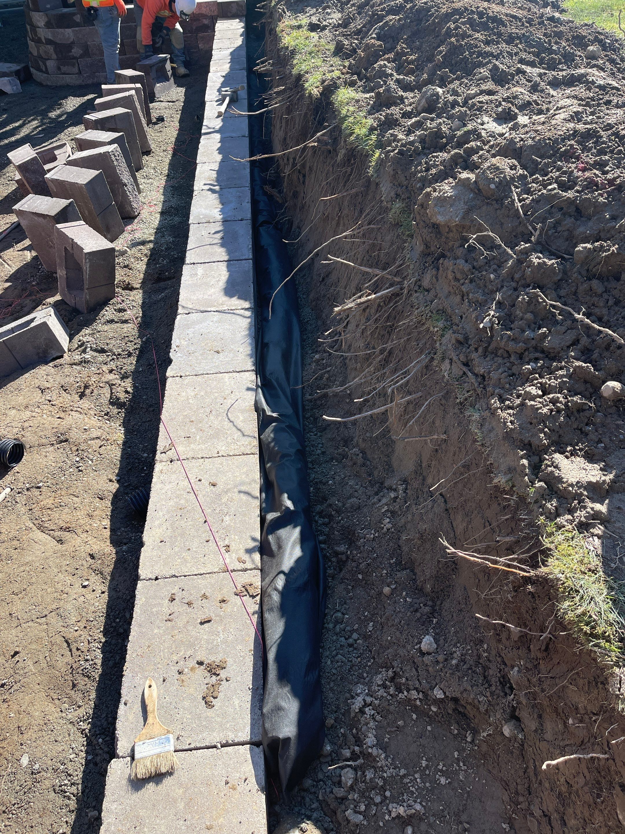 Lorra | Asphalt Driveway Repair & Retaining Wall by Jireh Asphalt & Concrete Inc 