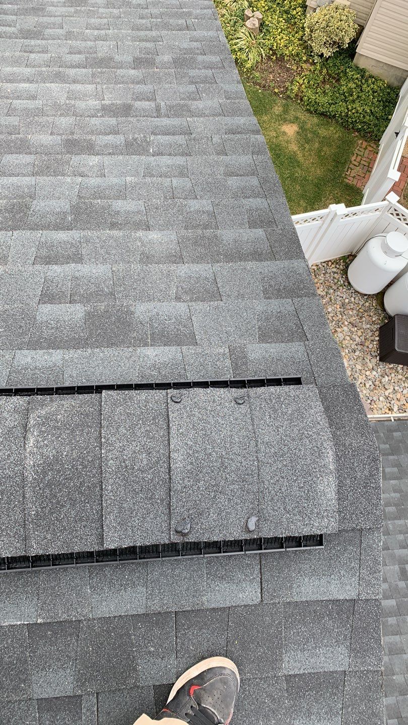 Roof Replacement with GAF Decotech integrated solar panels by American Home Contractors