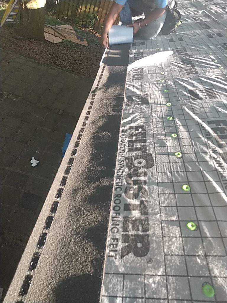 Residential Roofing Installation using Roof Replacement by American Roofing & Construction LLC