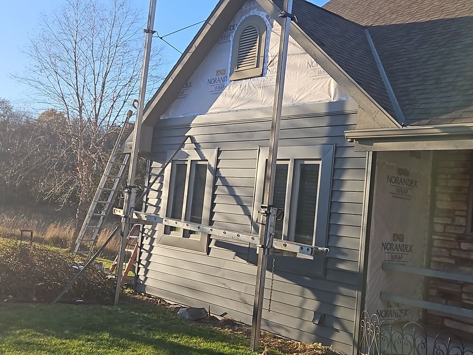 Siding Installation using Norandex Polar Wall Plus Siding, Window Wraps by Total Exteriors