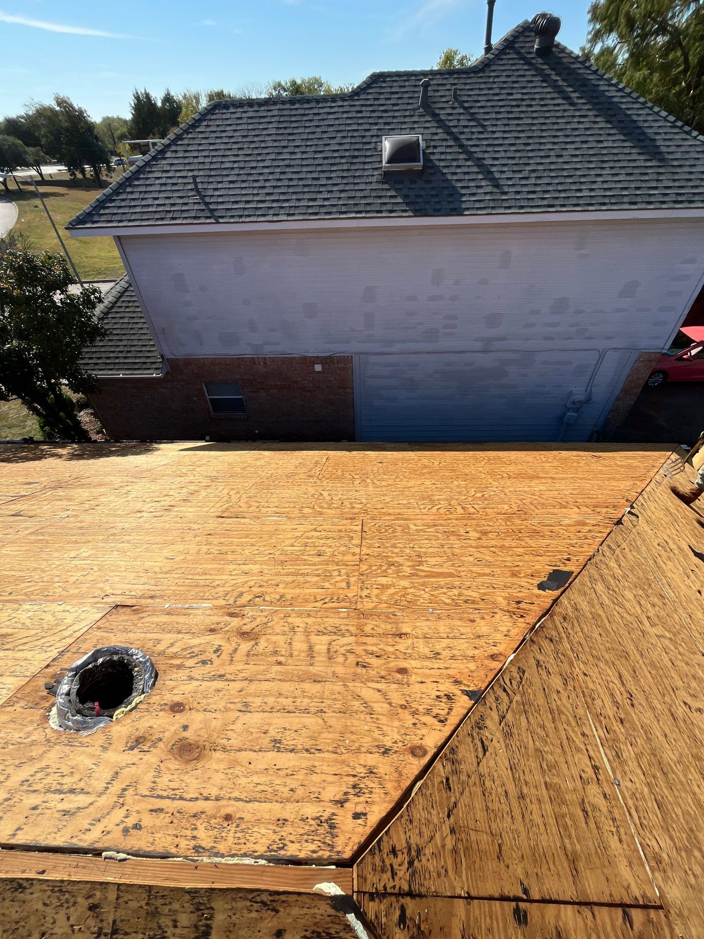 Reroof After Eclipse Hailstorm by Berry Good Roofing 