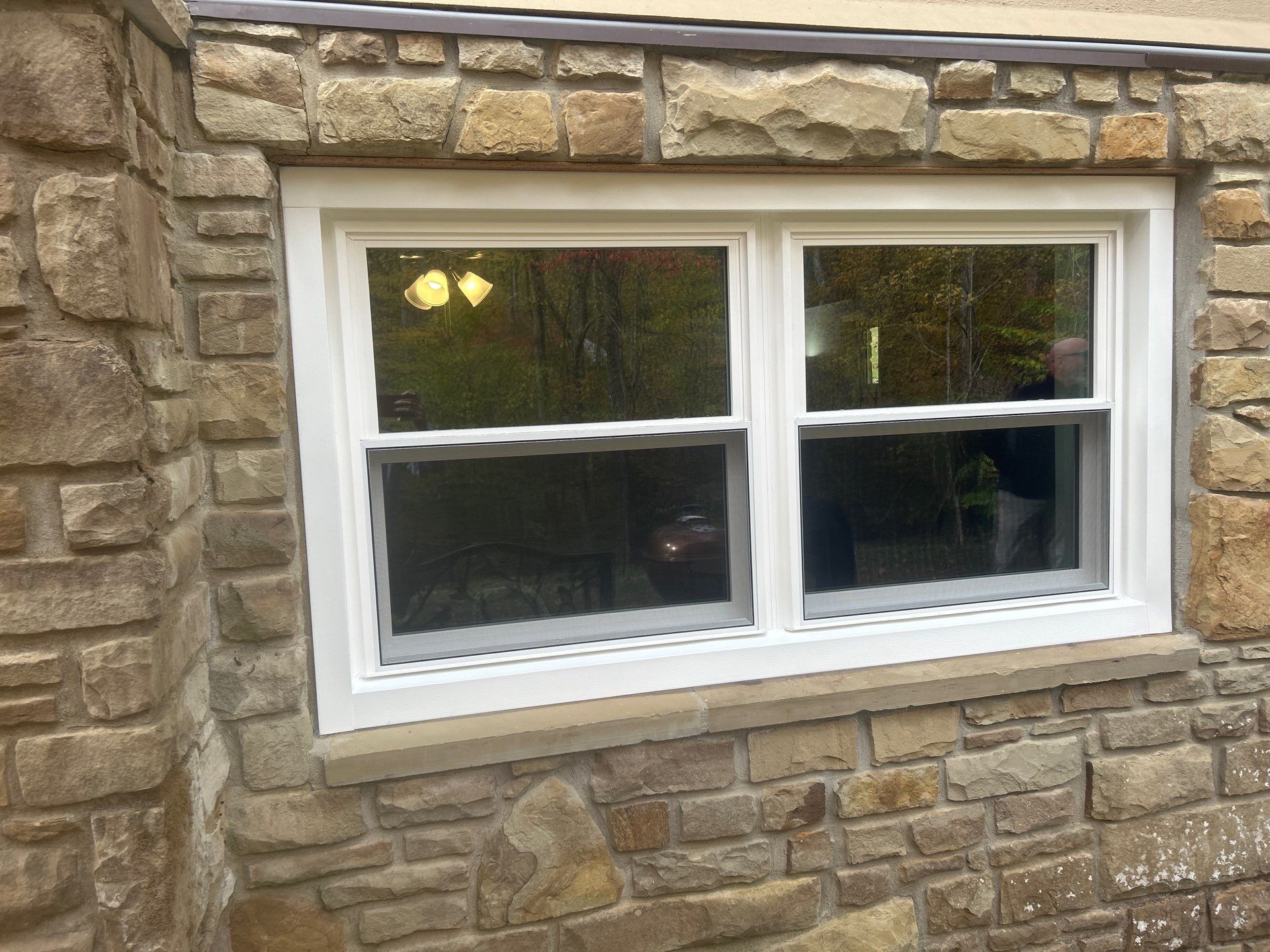 Entry Door and Window Installation for Nashville Stone Home by Merrifield Exteriors, LLC