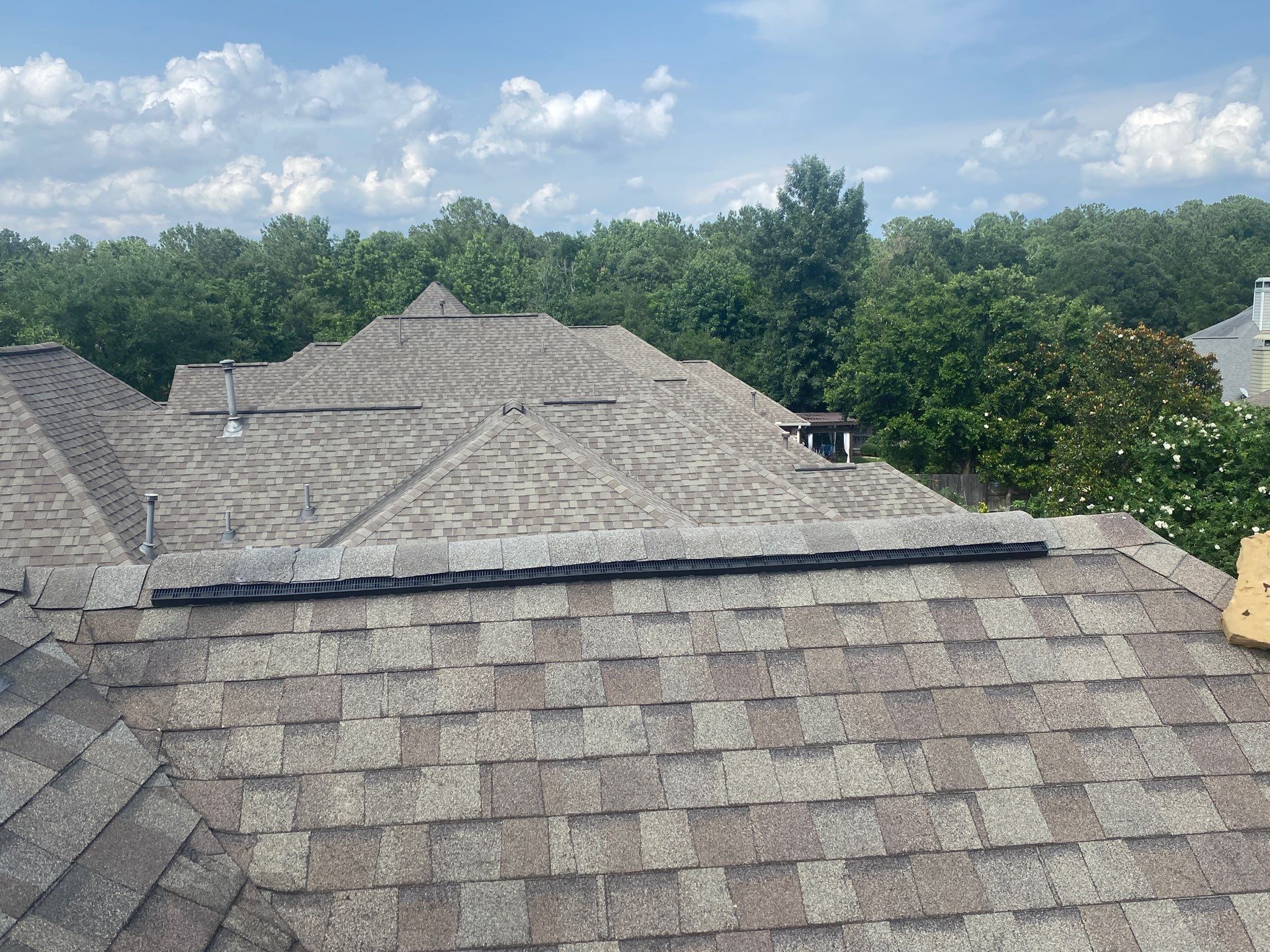 Hail Damage using Owen's Corning Duration (Lifetime) Shingles by Roof Repair Company
