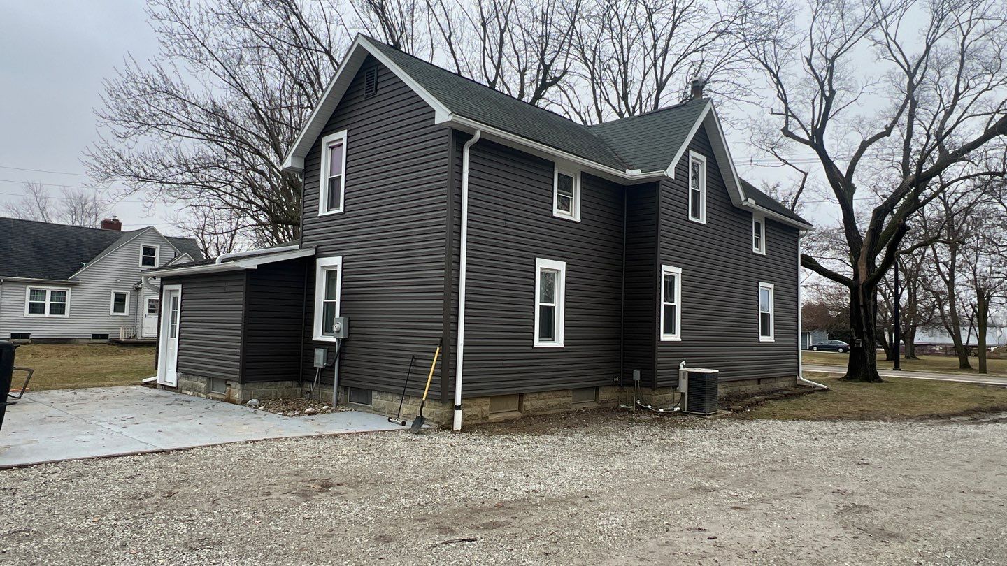 Residential fascia replacement using Exterior Portfolio 4.5 DL - Peppercorn by Nitro Roofing and Construction