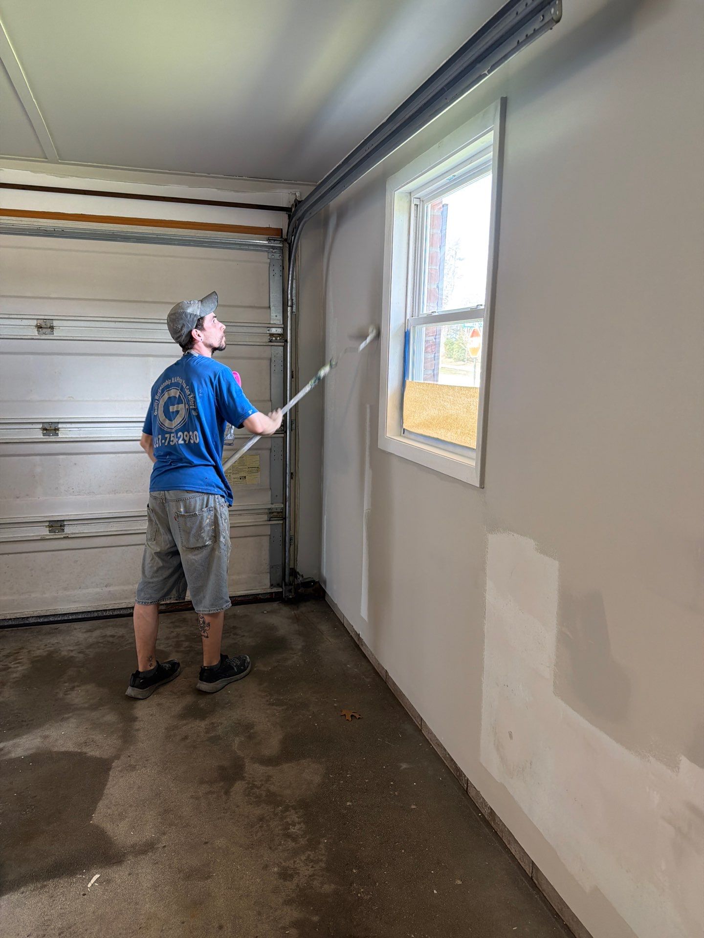 Muskegon Garage Interior Painting and Epoxy Flake Floor Installation by Gordon Painting