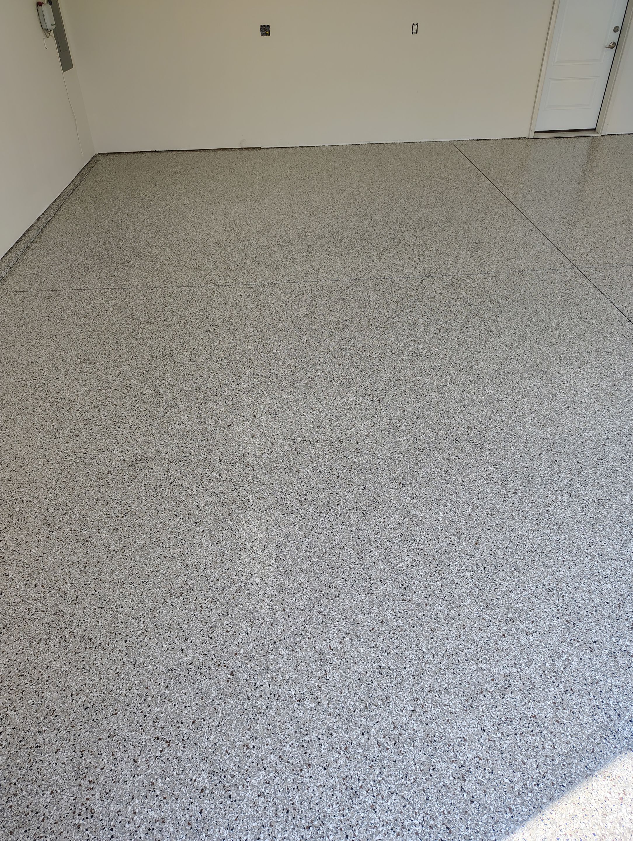 Garage Floor Coating with Coyote Decorative Chip in Tea by Select Painting, Coatings & Garage Cabinets