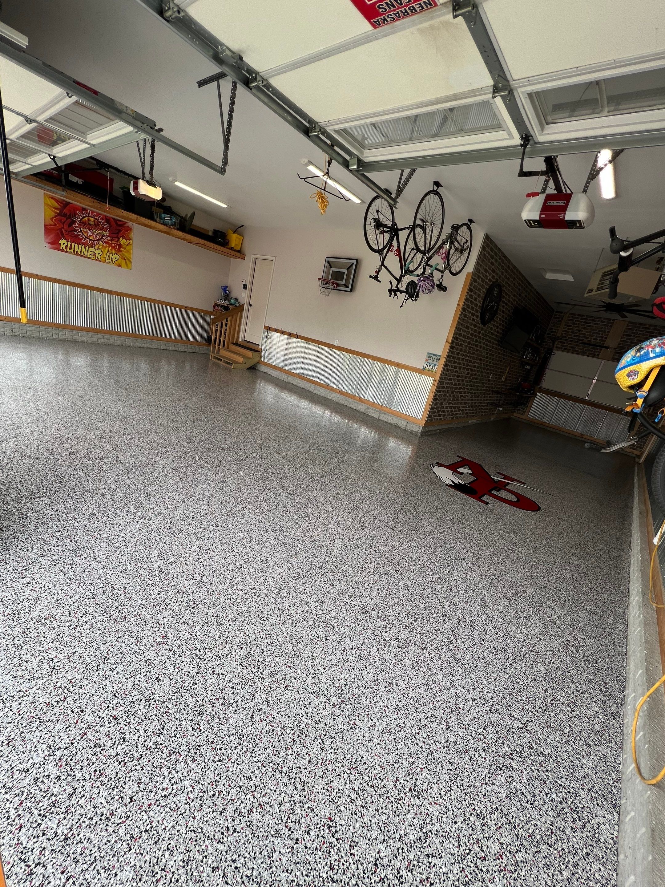 Floor epoxy coating and floor engraving by Cutting edge painting 