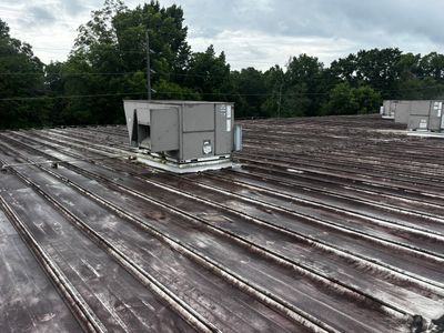 12,180 SQ Ft Commercial Metal Roof Restoration in Clarkston