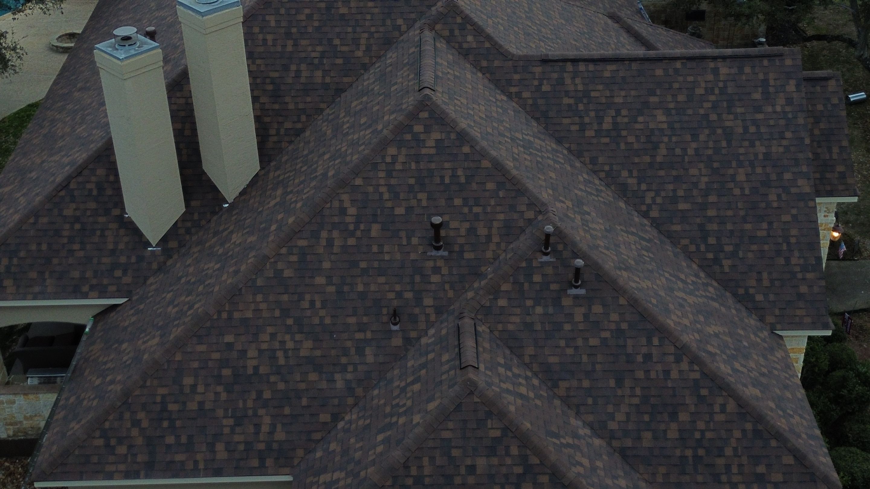 Residential Roof Replacement using 30 Year Laminate Shingles with High Profile Ridge by Premier Roofing and Contracting