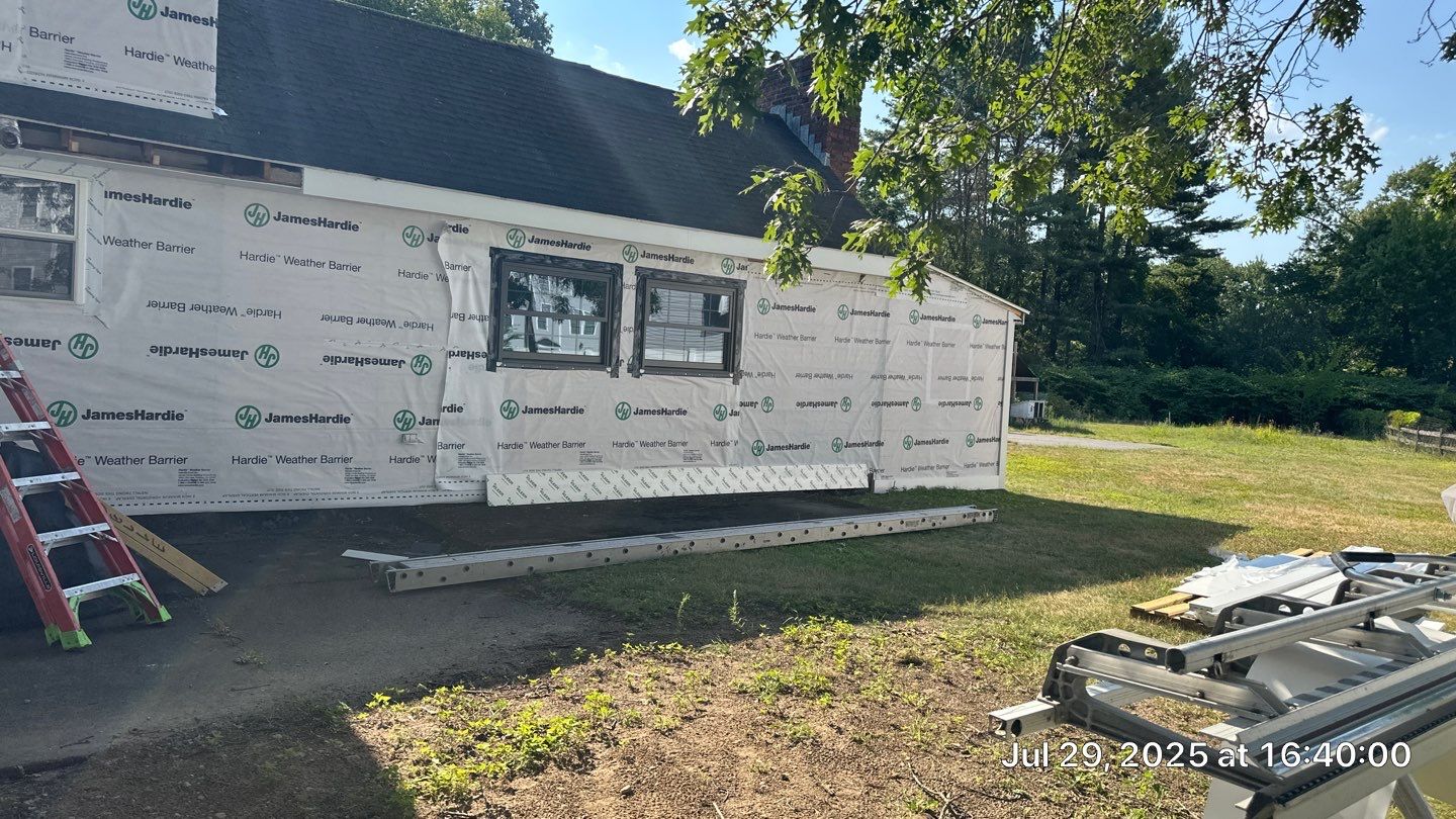 James Hardie Lap Siding Installation in Chelmsford, MA by Mighty Dog Roofing of Greater Middlesex County