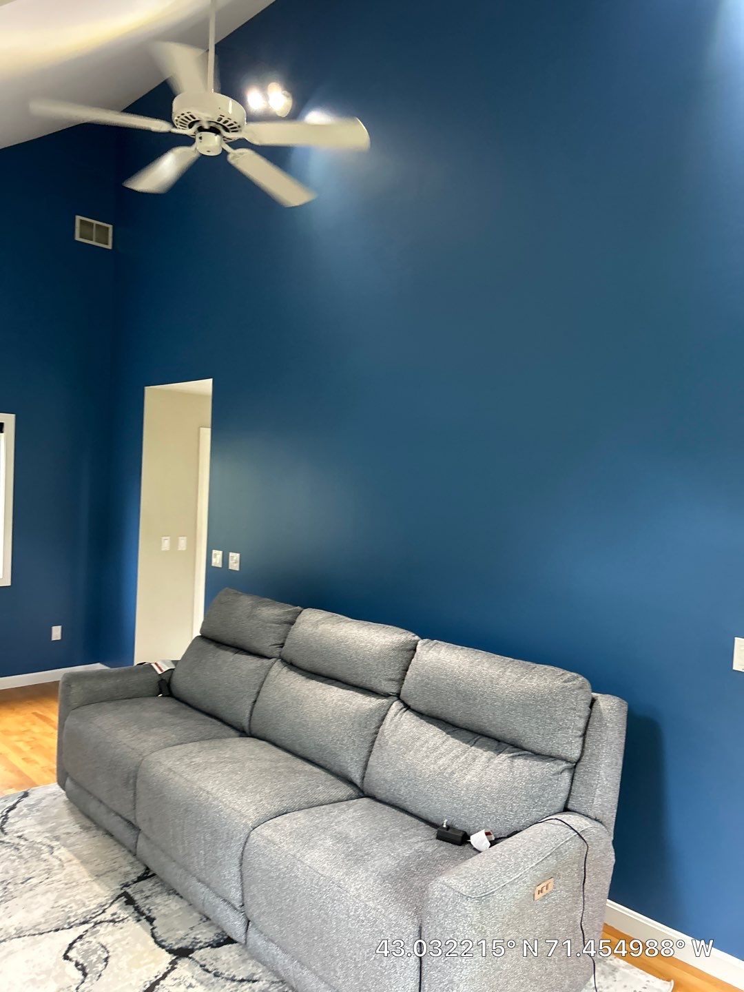 Interior Living Room Painting with Deep Blue Walls in Manchester by The Persnickety Painters