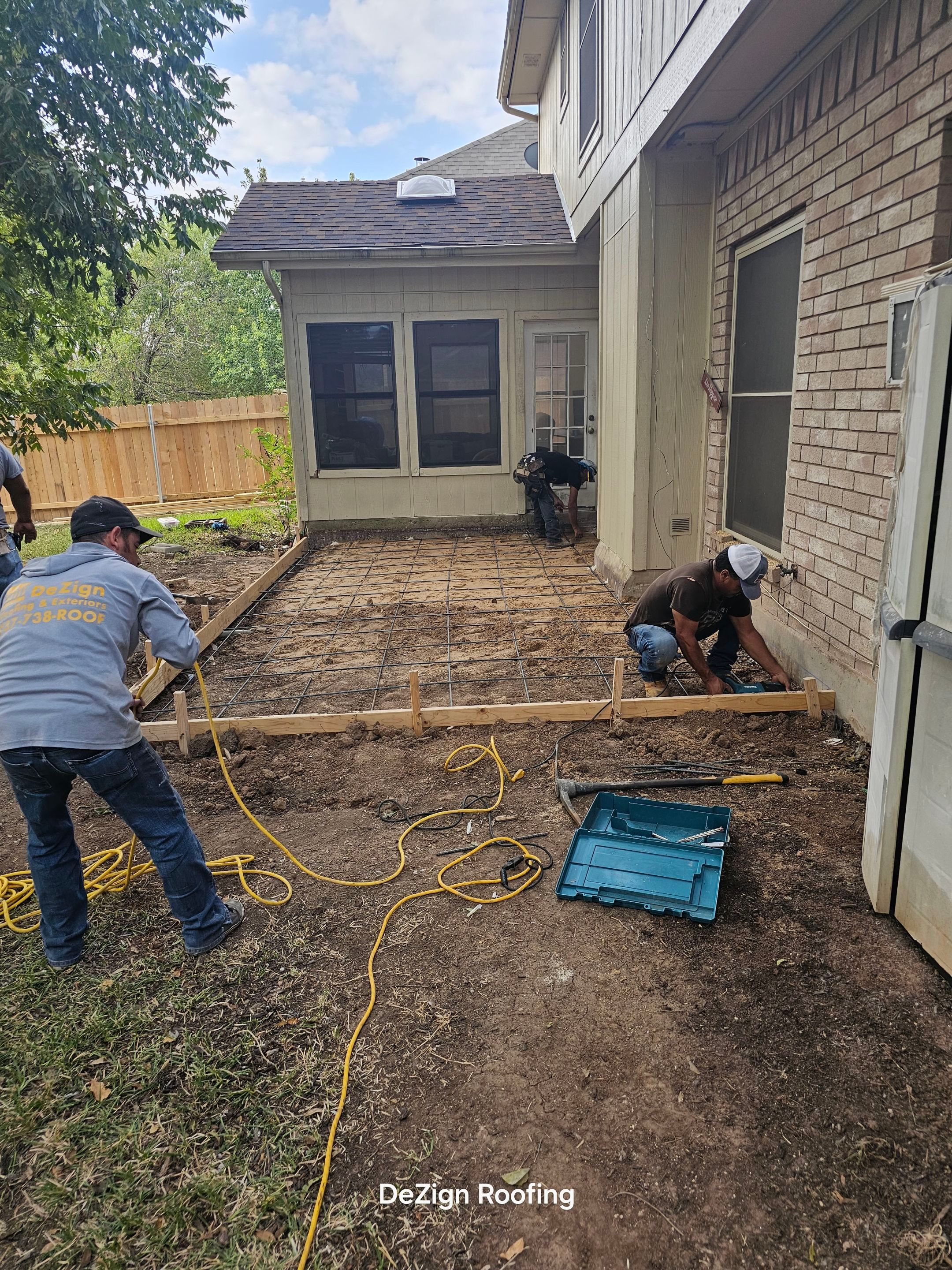 Beautiful New Covered Patio by DeZign Roofing & Exteriors