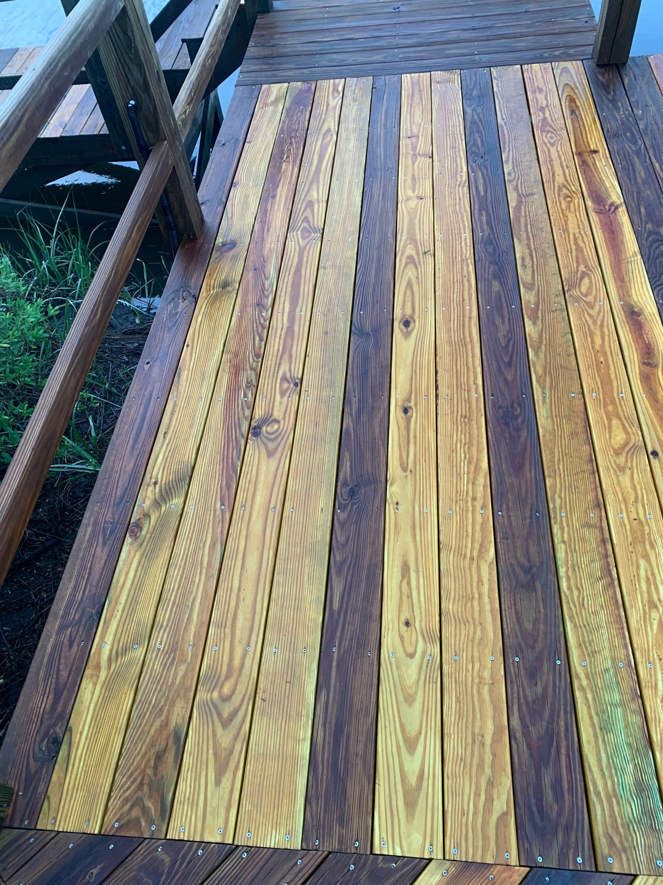 Dock, decks and carport using wood and concrete sealer by DuraSeal