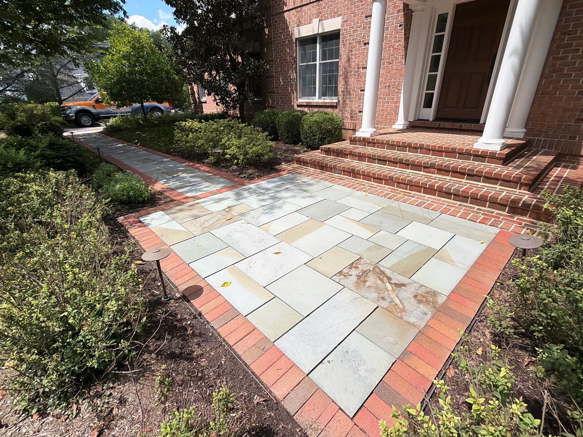 Composite Deck and Stone Paver Walkway power washing. by Baltimore Pressure Washers Inc.