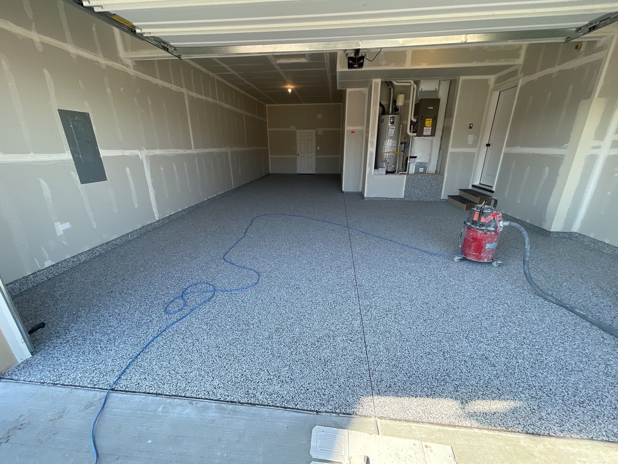 Garage Transformation using Domino by Croc Coatings, LLC