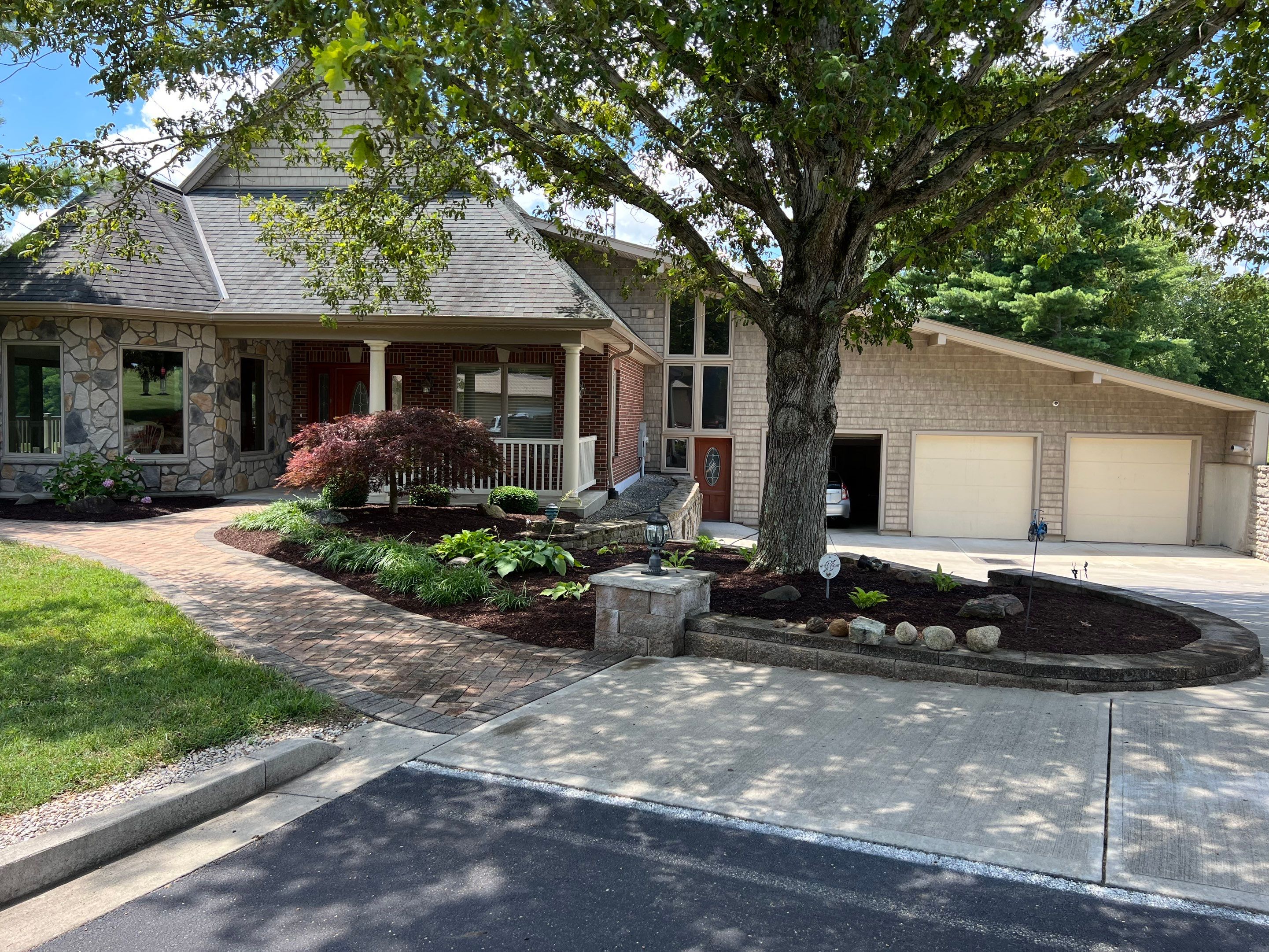 Tear Out, Plant Install & Mulch by Reisenberg’s Lawn & Landscape, LLC