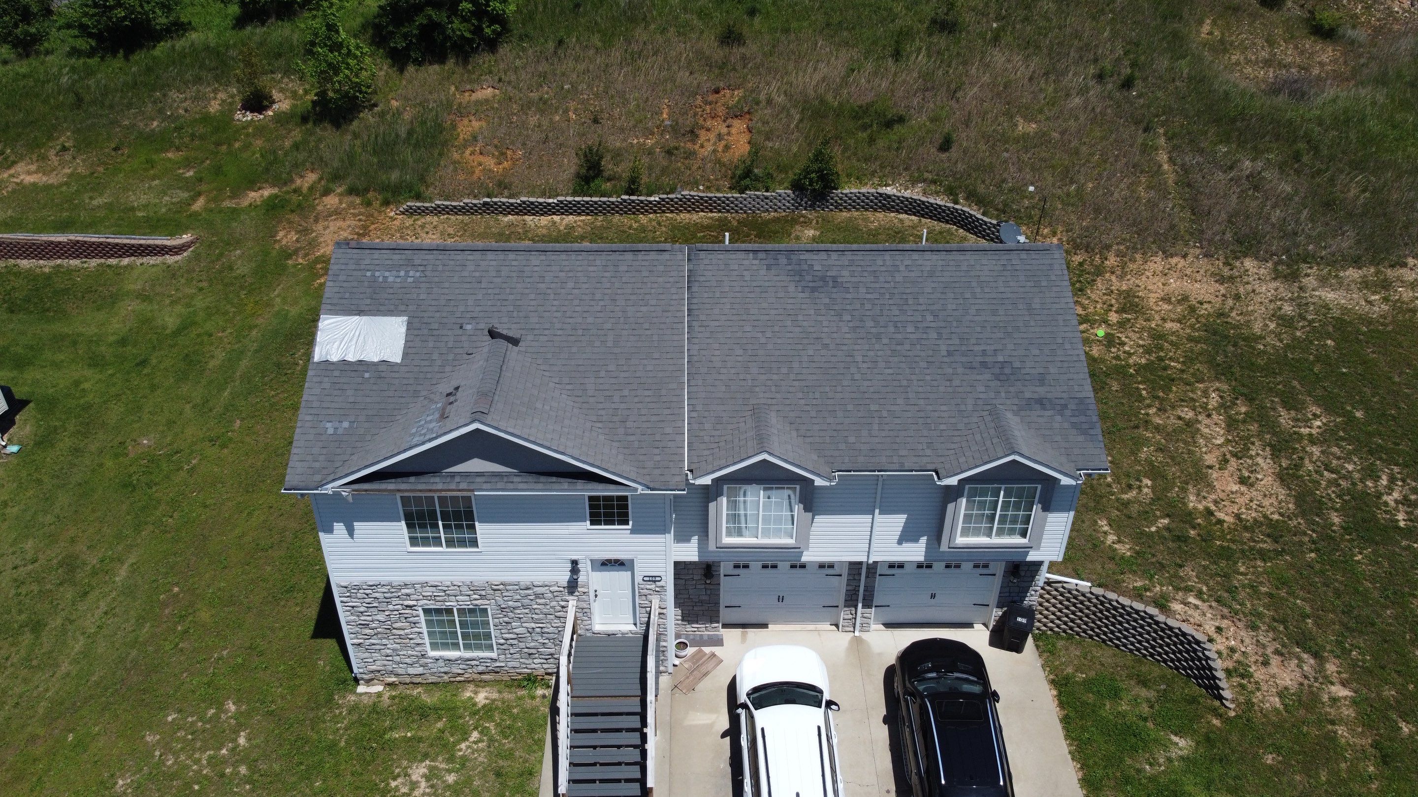 Residential Roofing + Gutter & Downspouts Install  by Titan Commercial & Residential Roofing 