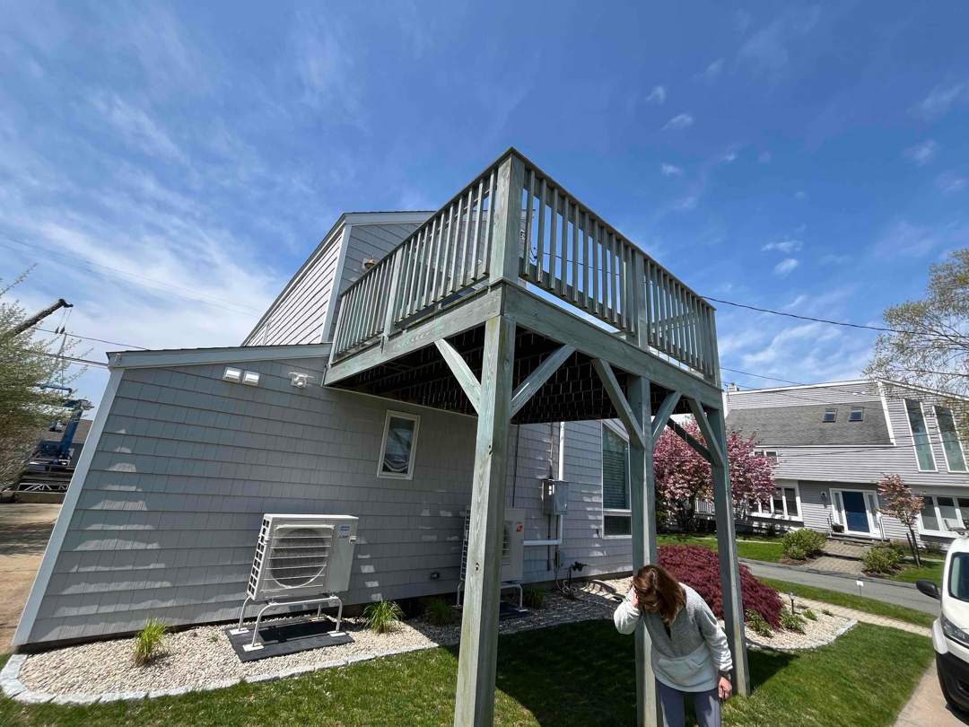 Deck Replacement Trex Lineage Island mist decking and Matching cocktail rail, Wrapped posts and beam.  by DiGiorgi Roofing and Siding Inc