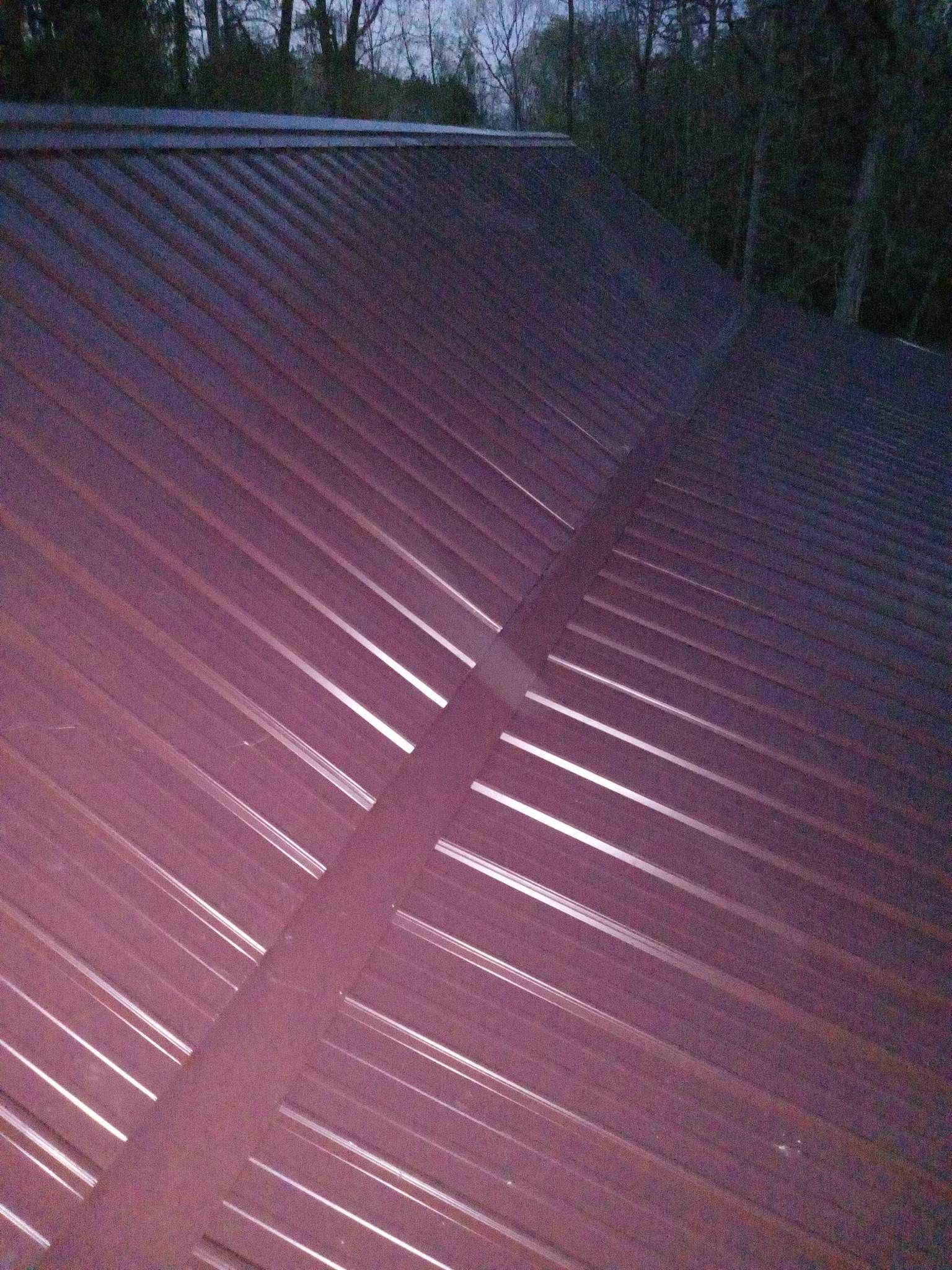 Residential Roofing Installation using Aluminum Roofing panels by Hostetler Roofing