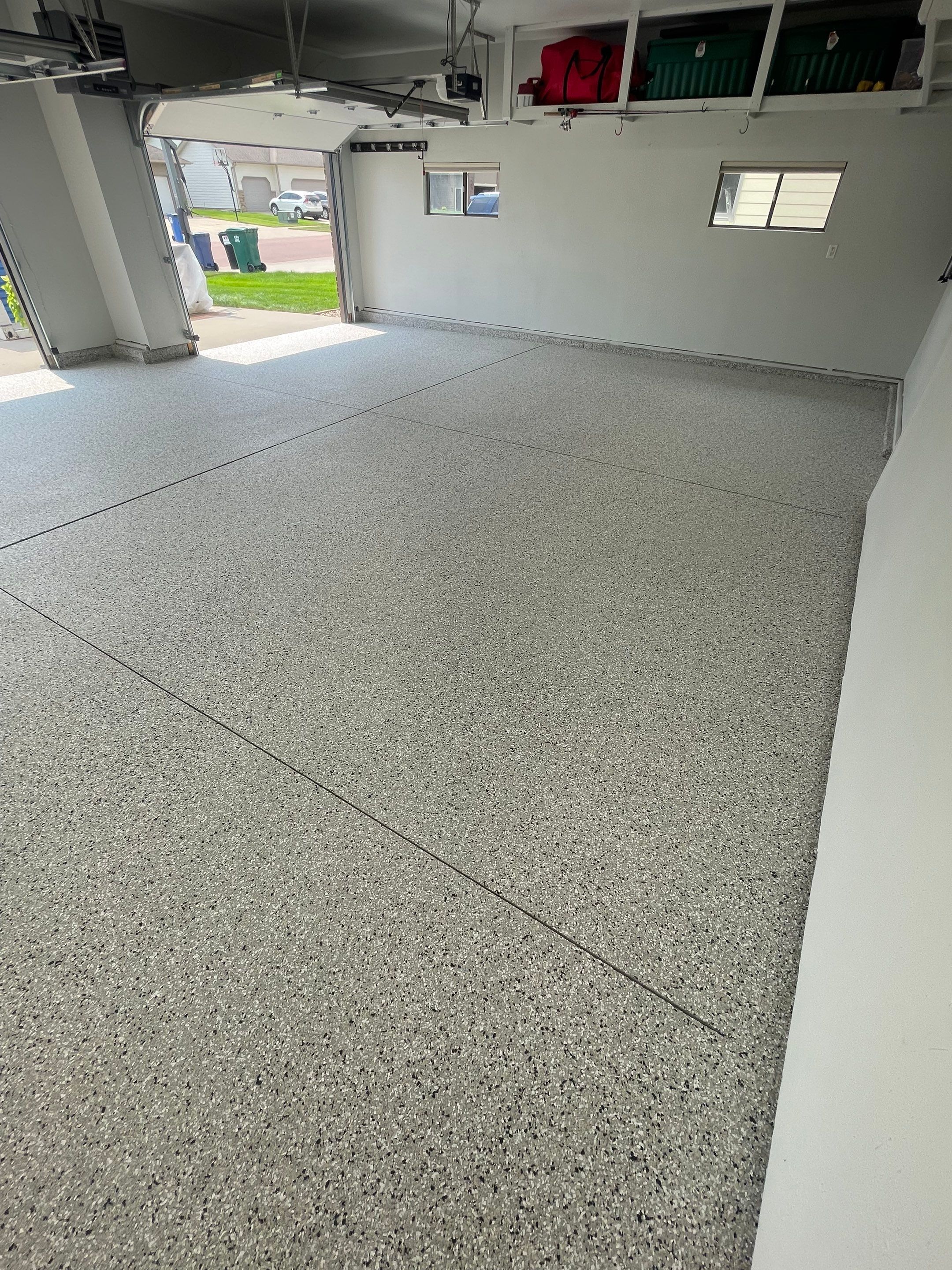 Multi-Car Garage Floor Coating and Crack Repair in Tea by Select Painting, Coatings & Garage Cabinets