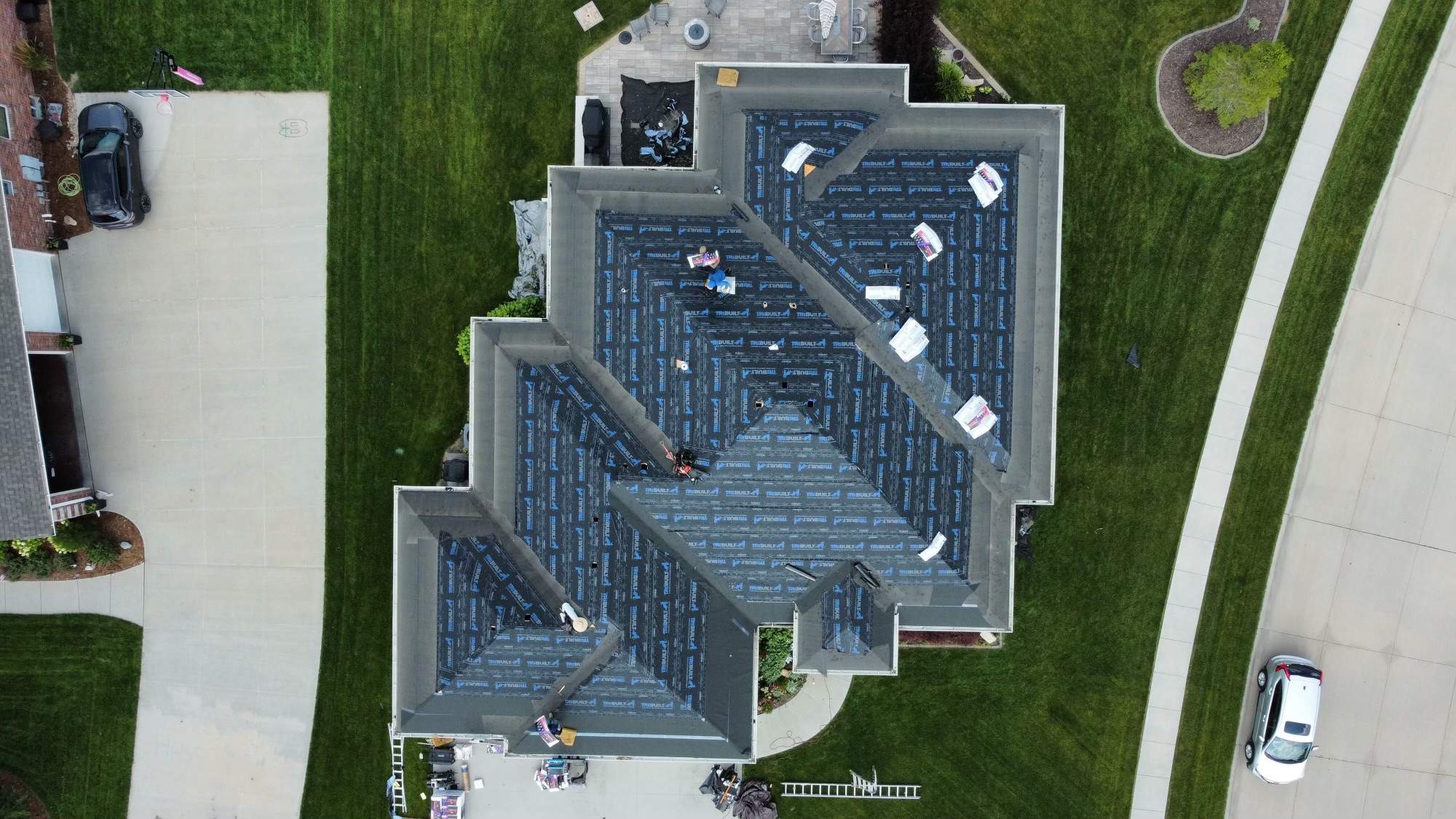 Residential Roofing Installation using TAMKO TITAN WEATHERED WOOD by Lightning Exteriors