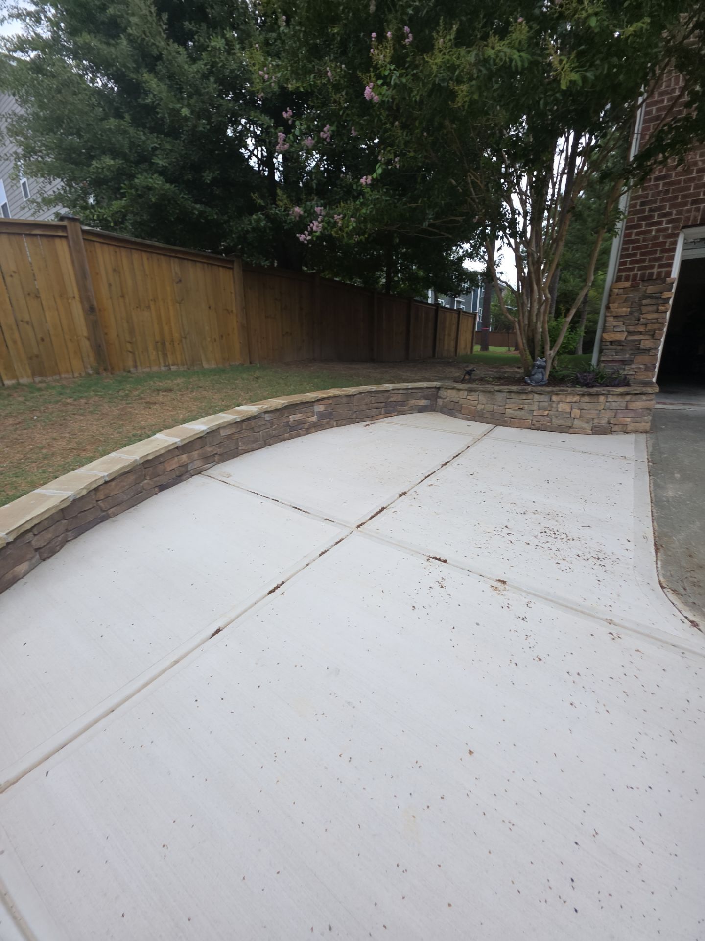 Concrete Driveway Expansion & Retaining Wall | Apex, NC by Elite Remodeling and Design LLC