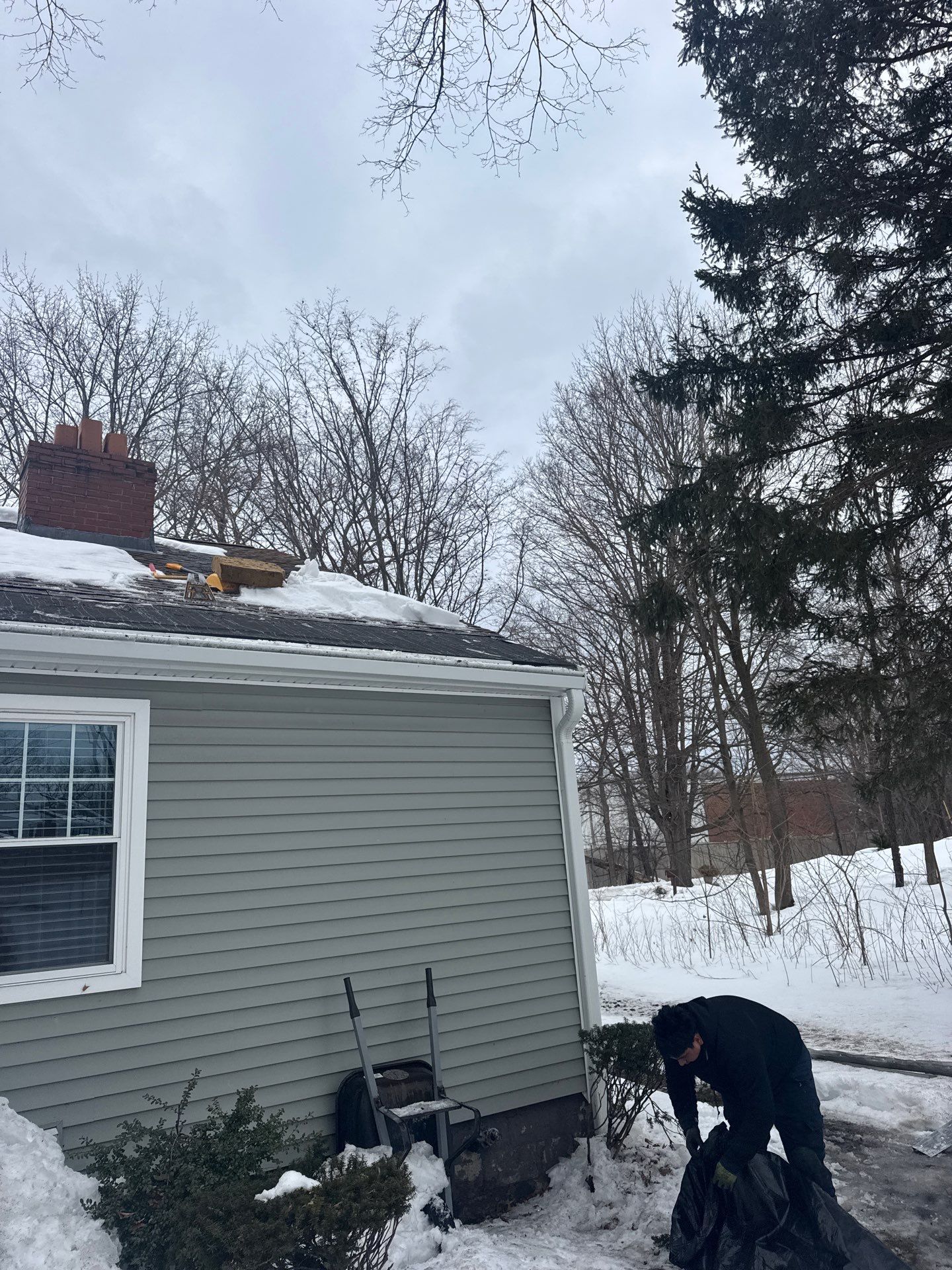 Snow/Ice Belt & Ice Dam Removal Project in Woburn by Mighty Dog Roofing of Greater Middlesex County