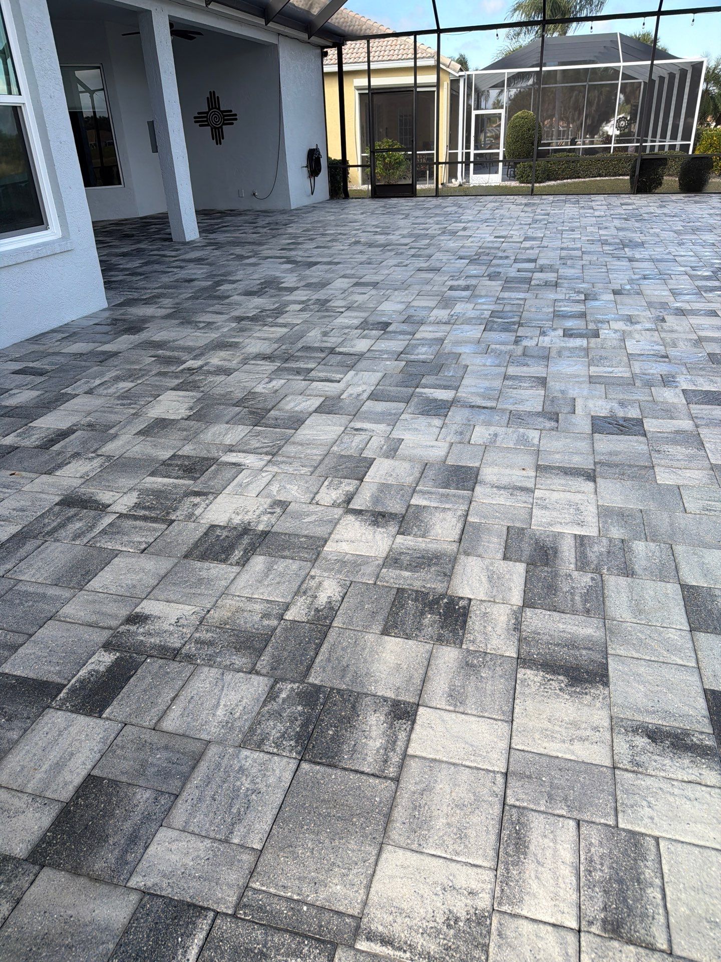 Paver Sealing and Restoration for Screened Lanai in Sun City Center by Supreme Paver Experts