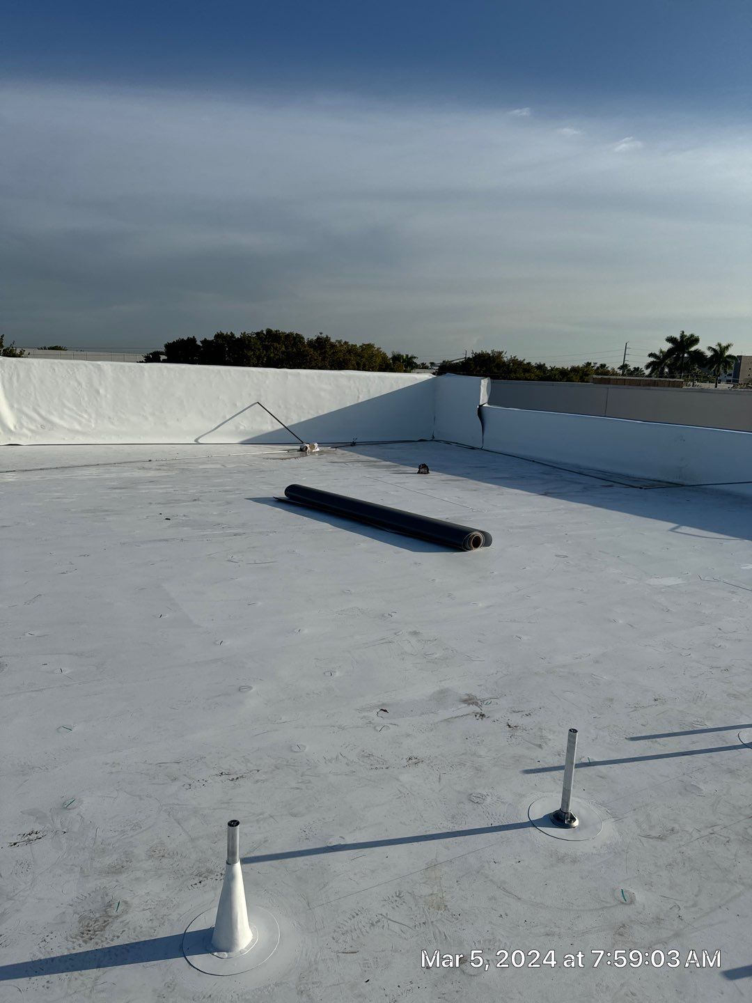 White TPO Membrane Roof Replacement at Doral Commercial Building by AJF ROOFING INC