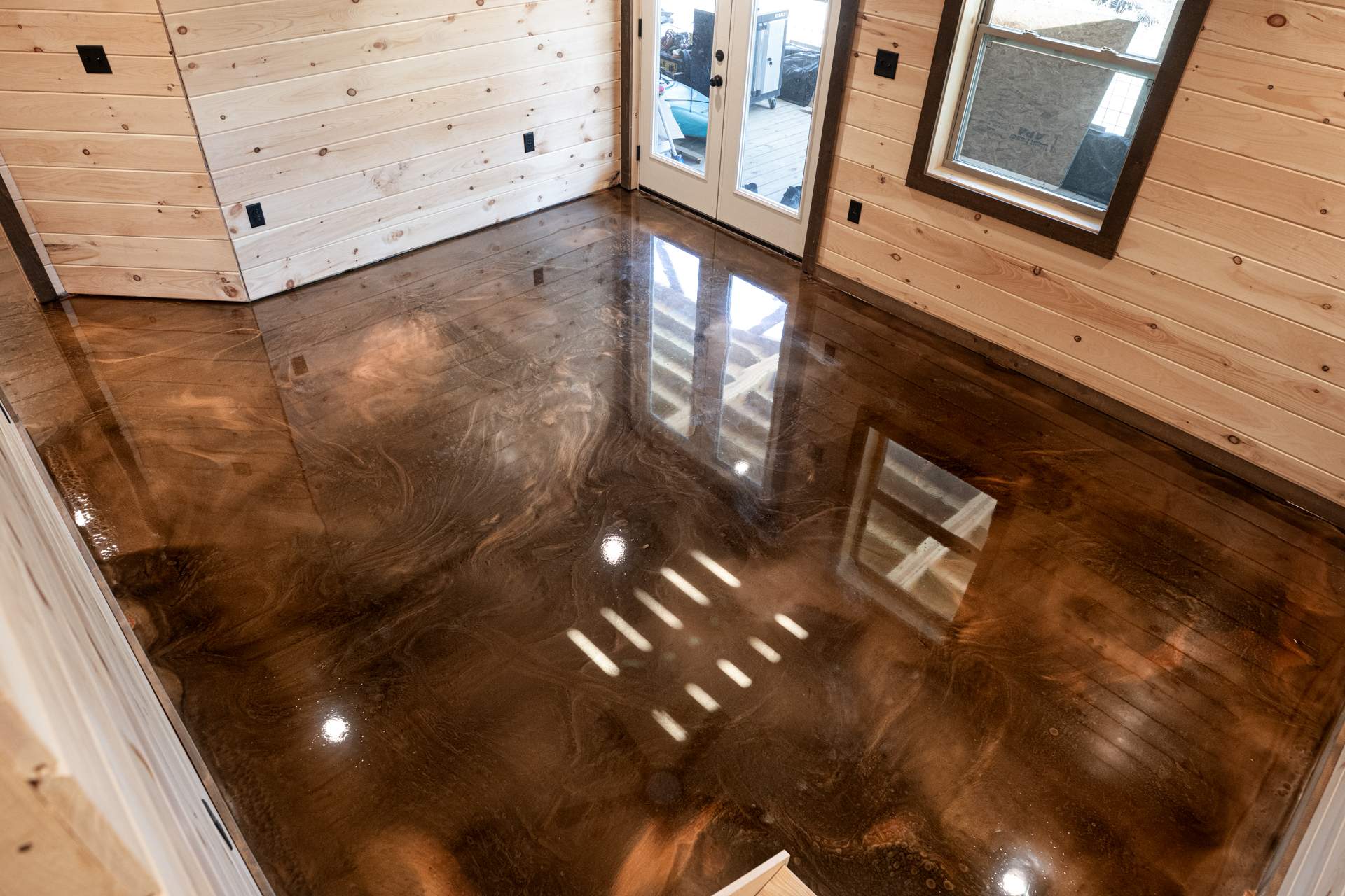 Stunning Metallic Epoxy Basement Installation by Elite Floor Solutions