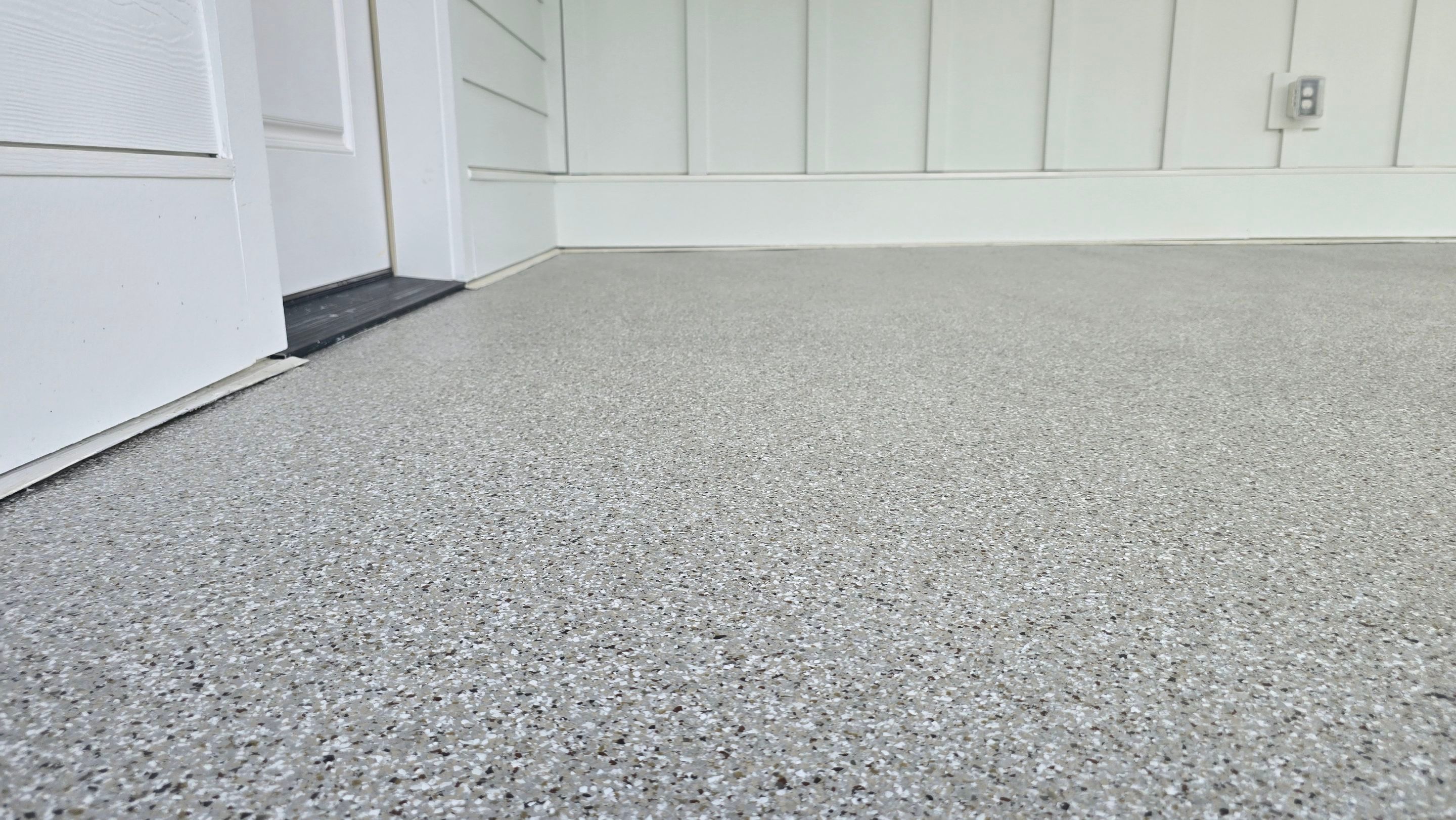Front Porch & Garage Using Creekbed by Elite Floor Solutions