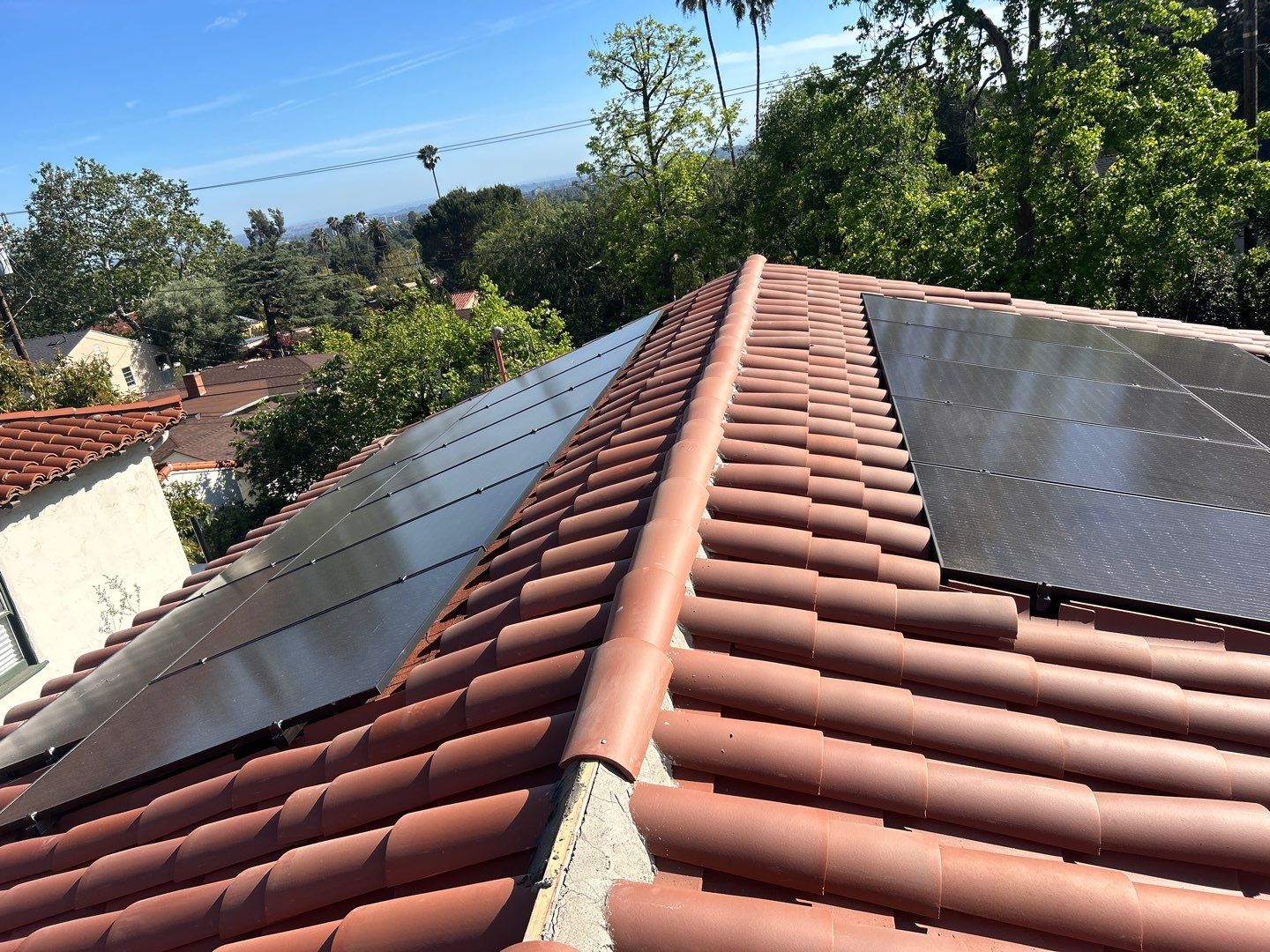 Spanish-Style Roof Replacement with Integrated Solar in Altadena by Reliable Roofing San Diego Inc.
