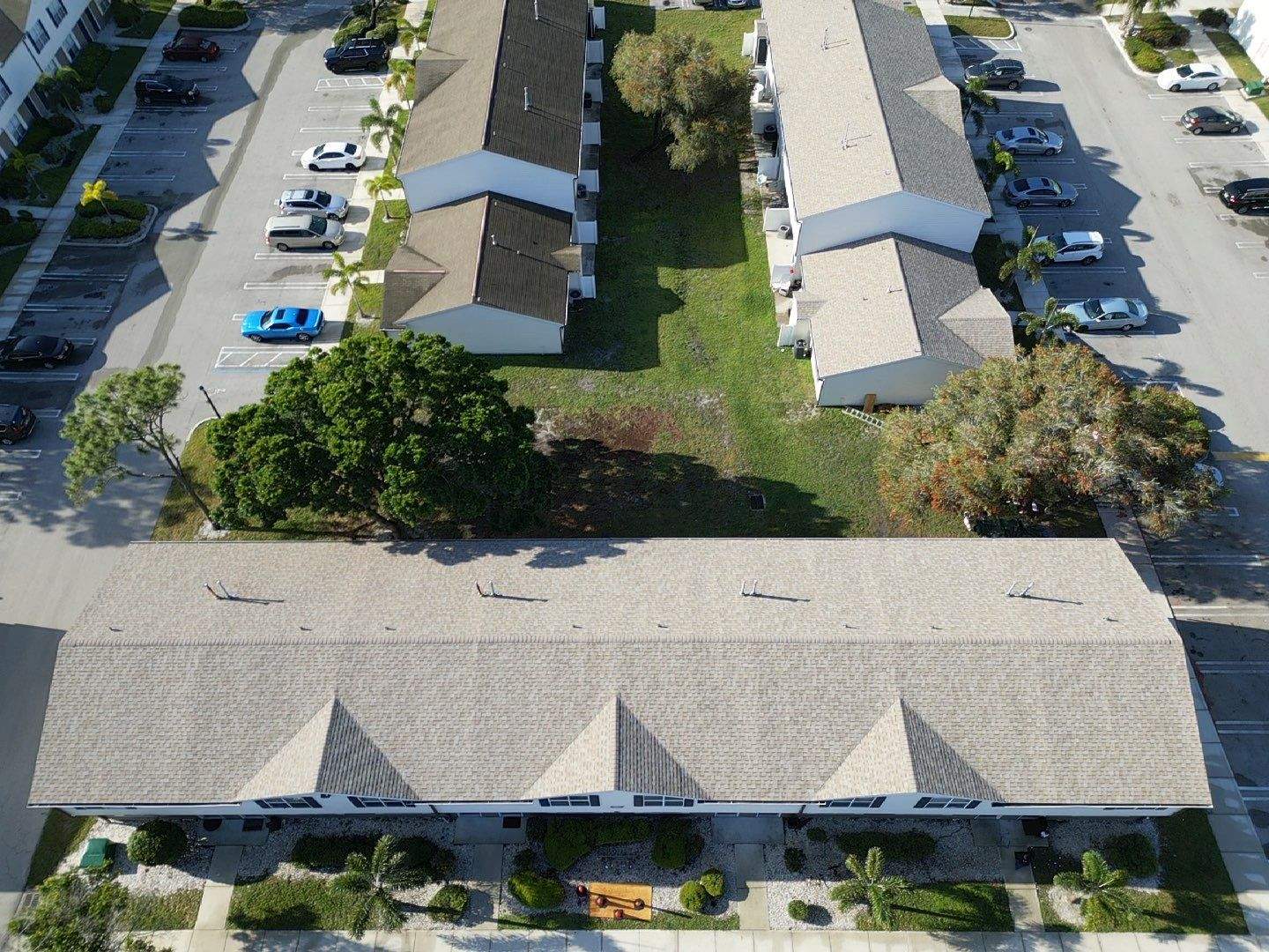 Apartment Complex Shingle Roof Replacement by Sailfish Roofing