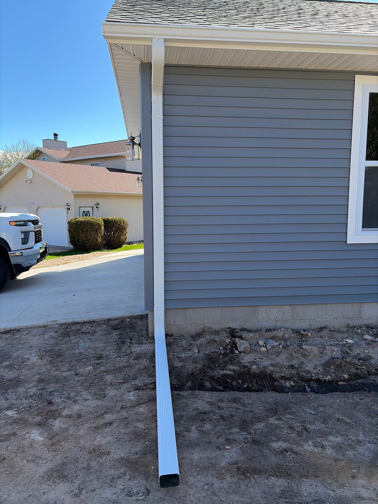 Gutter System Installation for New Home Construction in Petoskey by Rainbow Seamless Systems