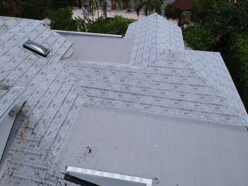 Residential Roofing Installation using 1" Nail strip metal roof by BLUES BROTHERS ROOFING