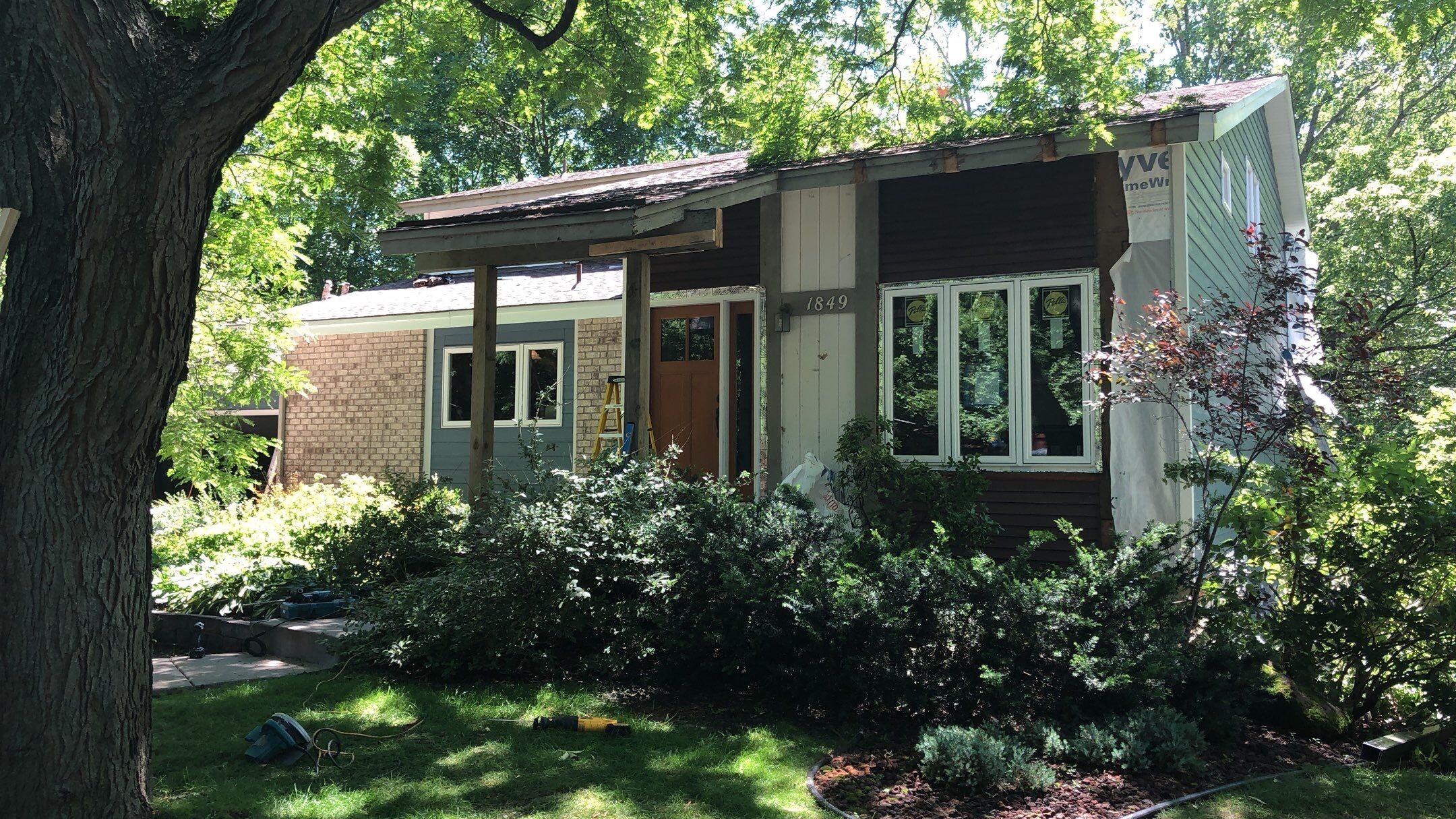 Siding Installation using LP SmartSide and Pella Vinyl Windows by MODERN EXTERIOR SYSTEMS